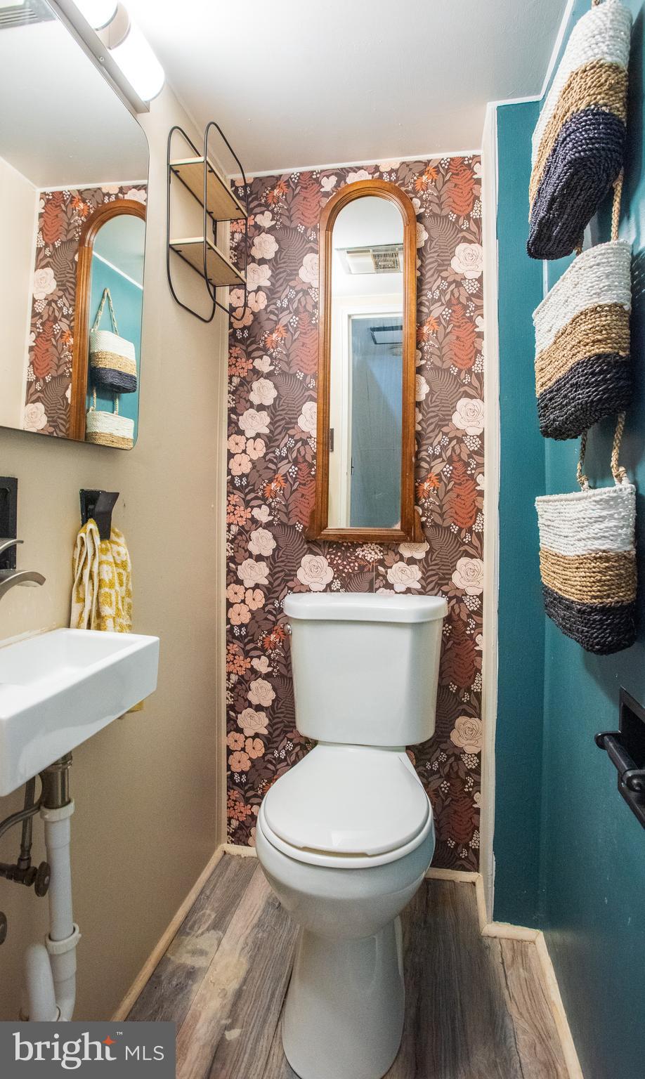 8601 Jackson Street Philadelphia, PA 19136 - Photo 12 of 33 a white toilet sitting next to a bathroom sink