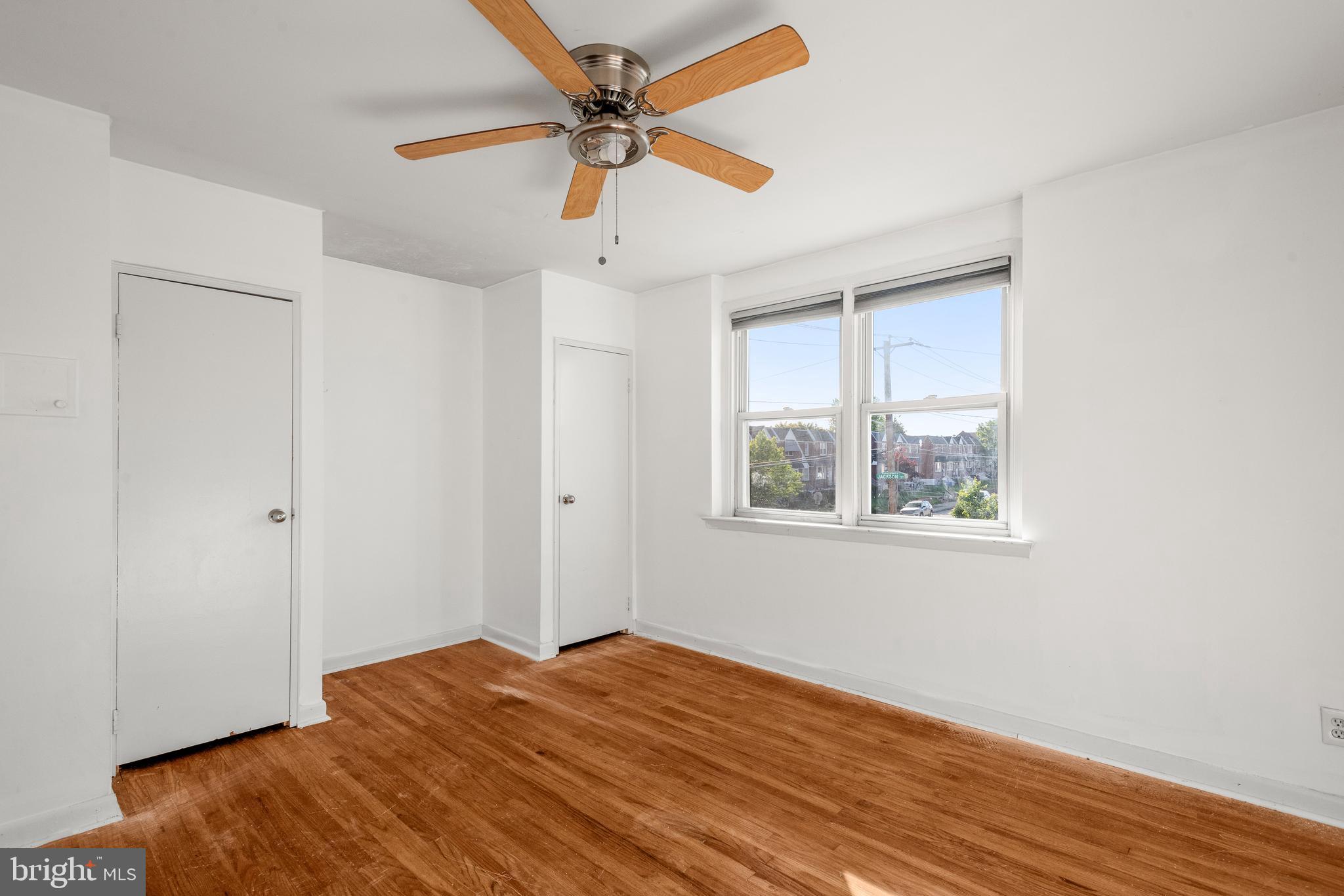 8601 Jackson Street Philadelphia, PA 19136 - Photo 15 of 33 a bedroom with wooden floor and a ceiling fan