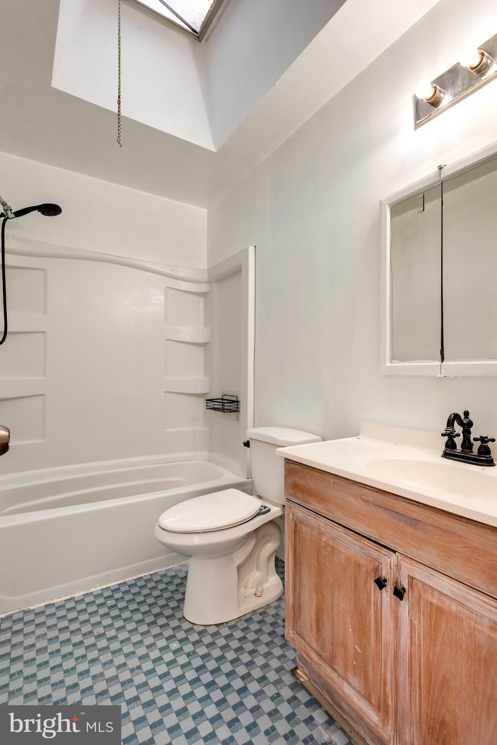 8601 Jackson Street Philadelphia, PA 19136 - Photo 18 of 33 a bathroom with a sink a toilet and shower
