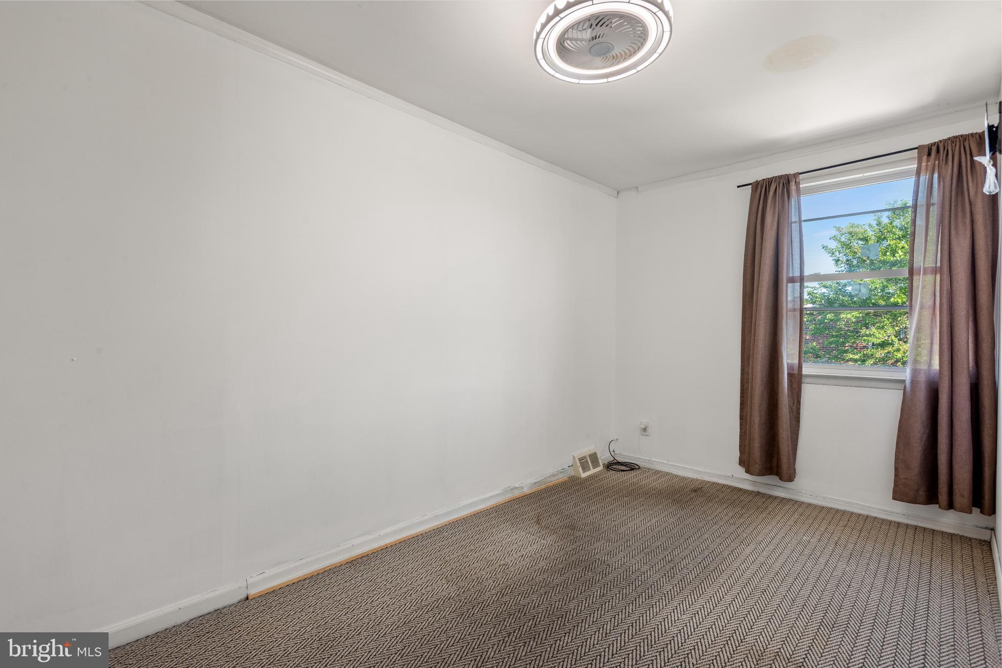 8601 Jackson Street Philadelphia, PA 19136 - Photo 19 of 33 a view of a livingroom with wooden floor and a window