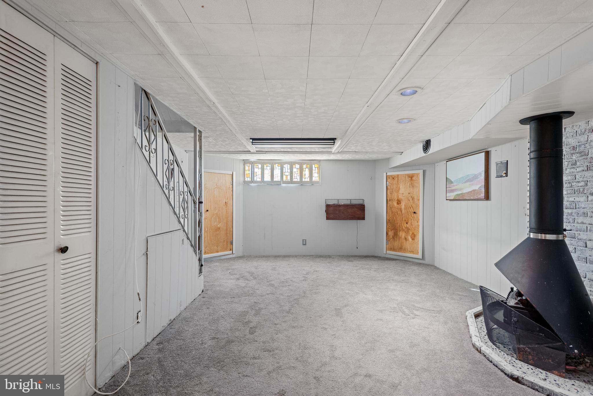 8601 Jackson Street Philadelphia, PA 19136 - Photo 22 of 33 a view of empty room with wooden floor and fan