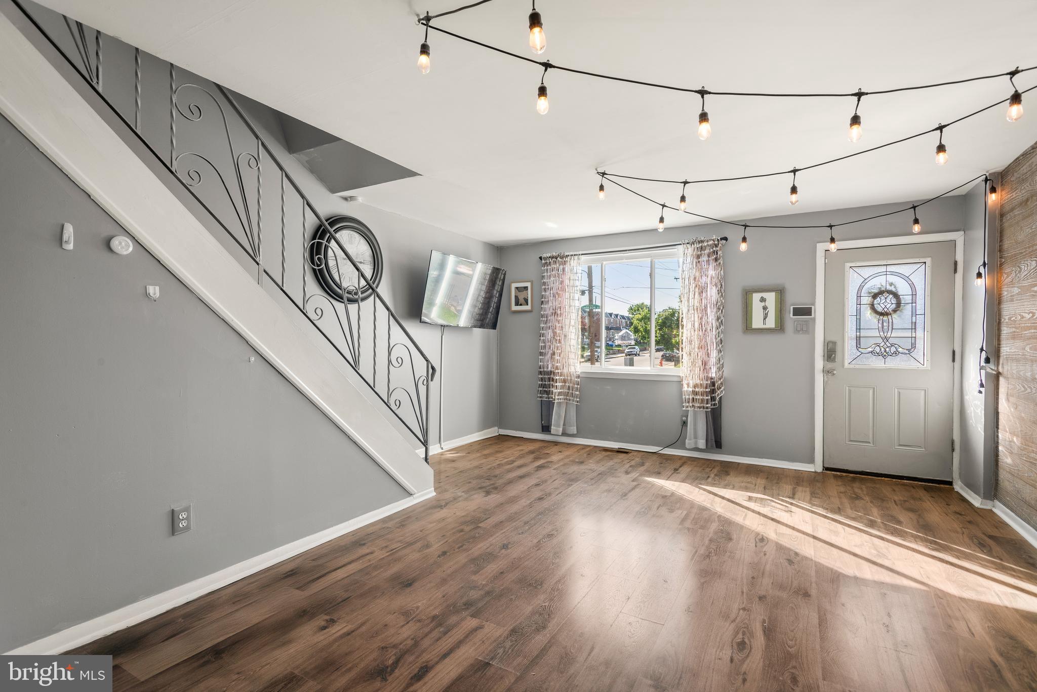 8601 Jackson Street Philadelphia, PA 19136 - Photo 3 of 33 a view of a hallway with window and wooden floor