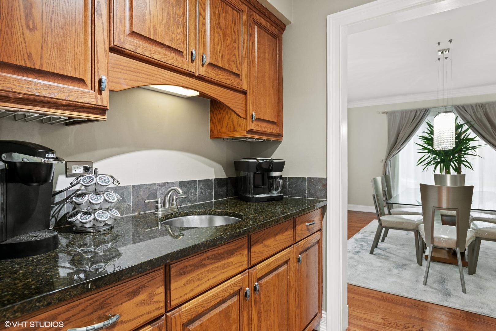 601 Partridge Drive West Chicago, IL 60185 - Photo 11 of 39 a kitchen with stainless steel appliances granite countertop a sink a stove and cabinets