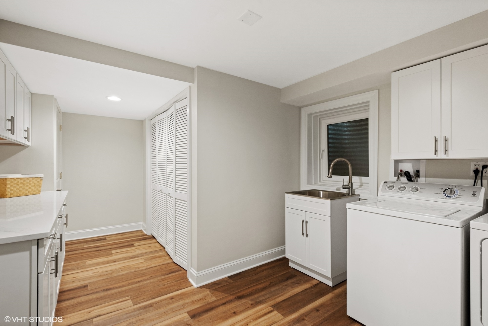 601 Partridge Drive West Chicago, IL 60185 - Photo 27 of 39 a view of a kitchen with a sink washer and dryer