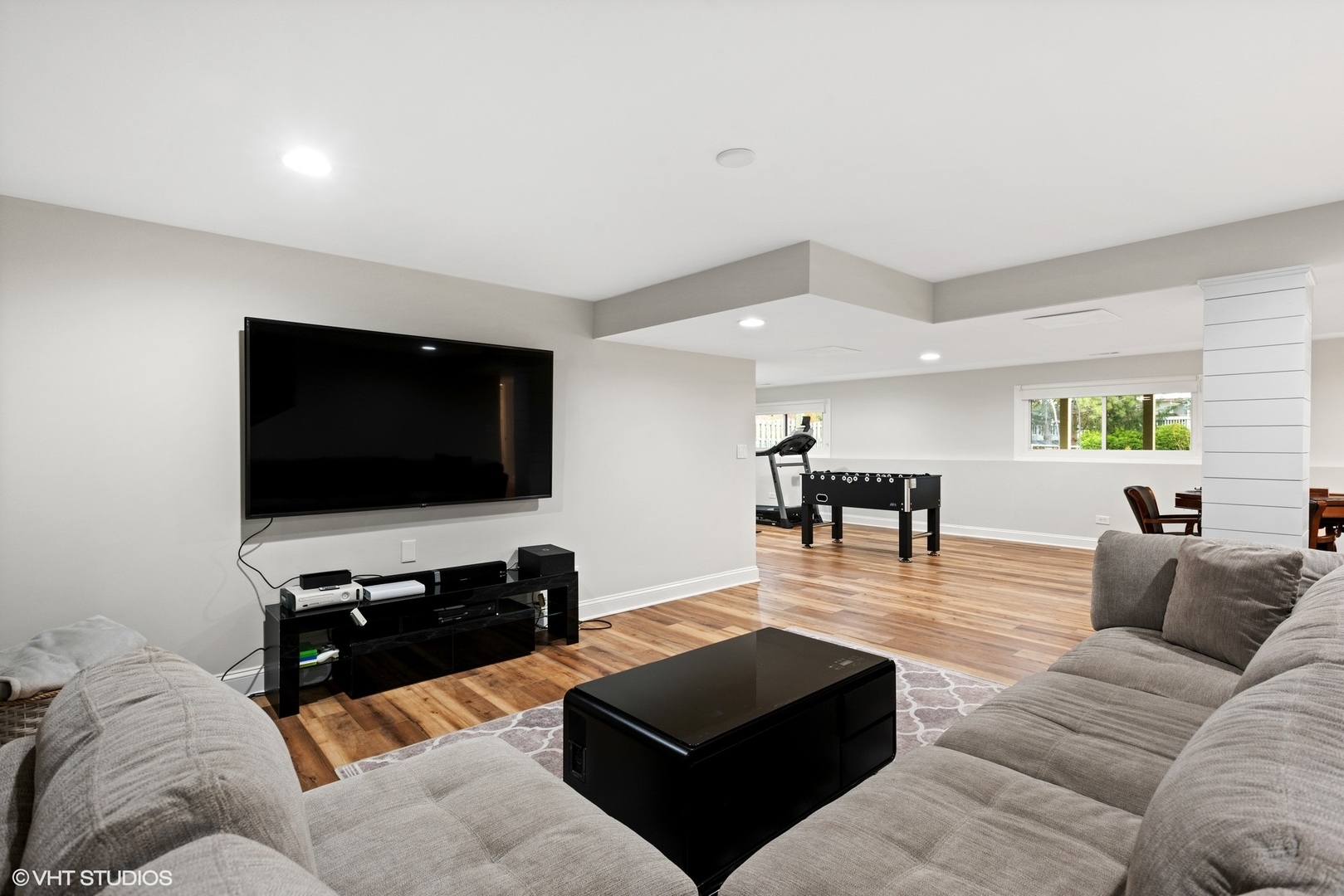 601 Partridge Drive West Chicago, IL 60185 - Photo 29 of 39 a living room with furniture and a flat screen tv