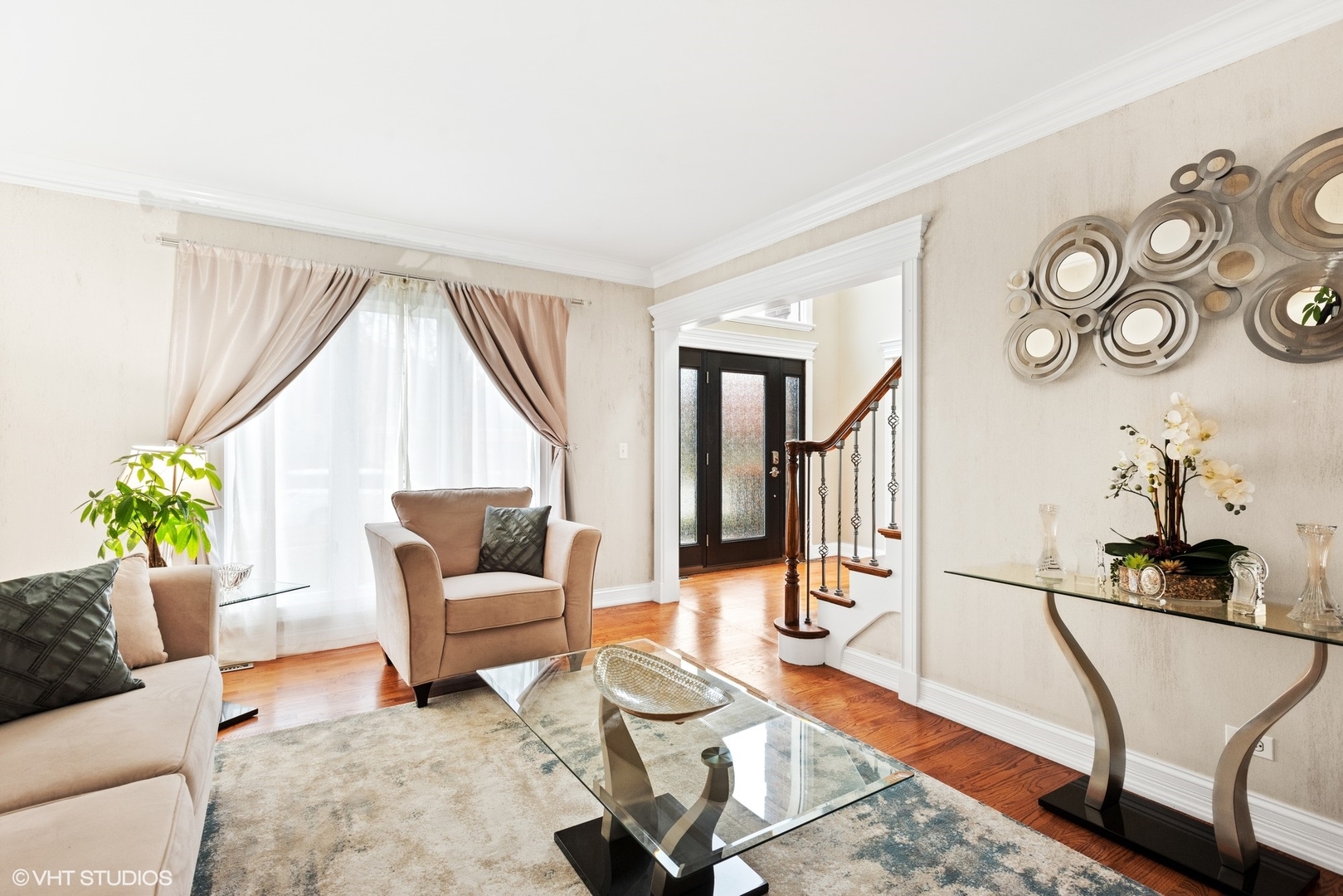 601 Partridge Drive West Chicago, IL 60185 - Photo 5 of 39 a living room with furniture and wooden floor