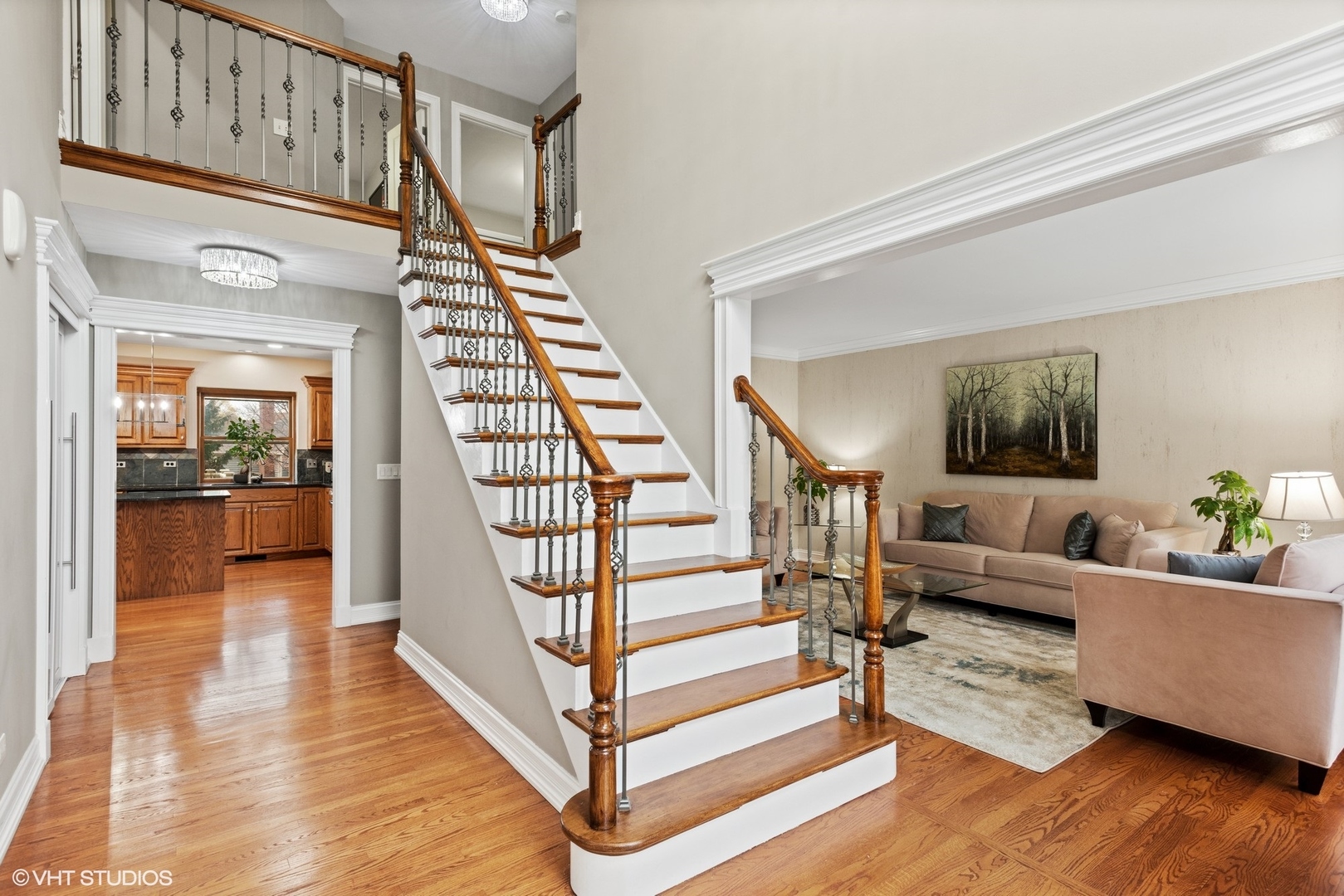 601 Partridge Drive West Chicago, IL 60185 - Photo 7 of 39 a view of entryway and hall with wooden floor