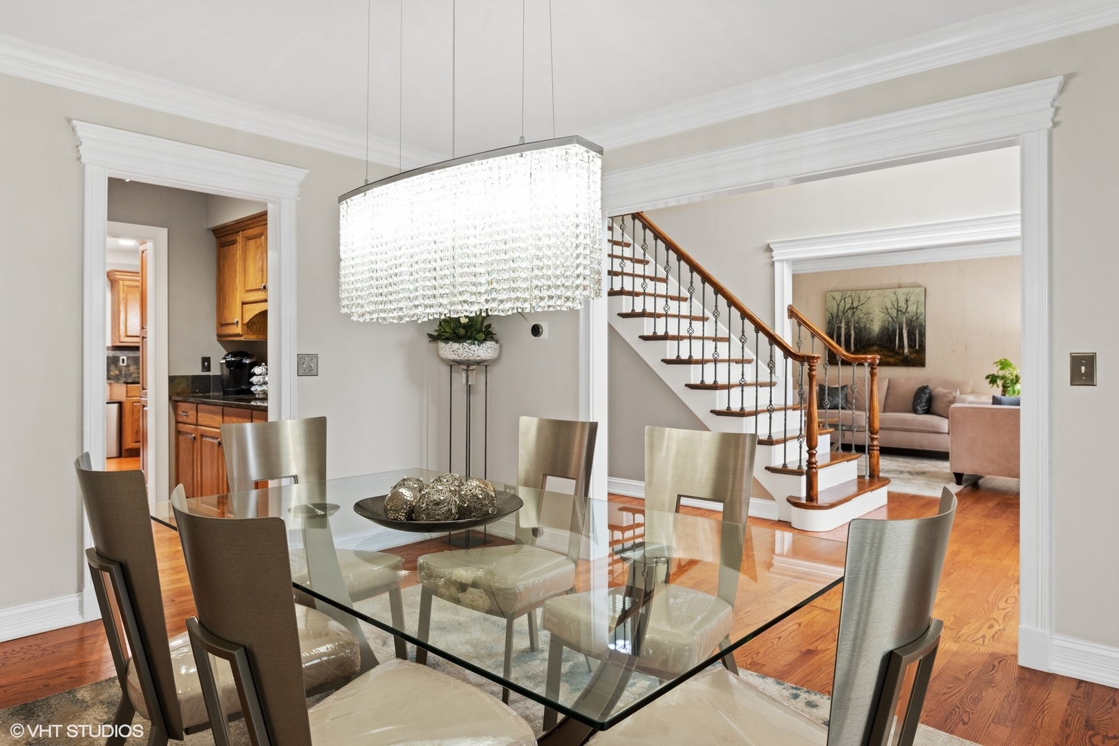 601 Partridge Drive West Chicago, IL 60185 - Photo 9 of 39 a view of a dining room with furniture and wooden floor