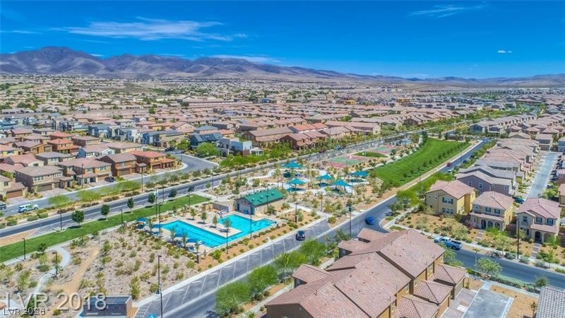 3144 Whitfeild Avenue Henderson, NV 89044 - Photo 37 of 55 An aerial perspective reveals a vibrant community with recreational amenities and desert landscaping.