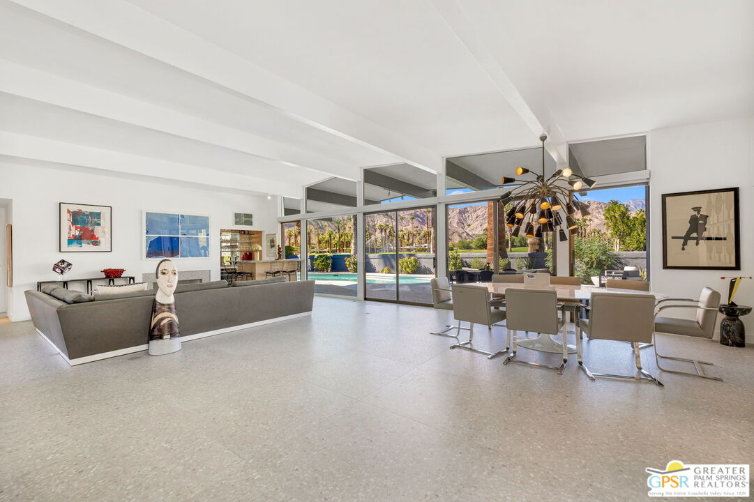 40181 Sand Dune Road Rancho Mirage, CA 92270 - Photo 13 of 75 a living room with furniture and a large window