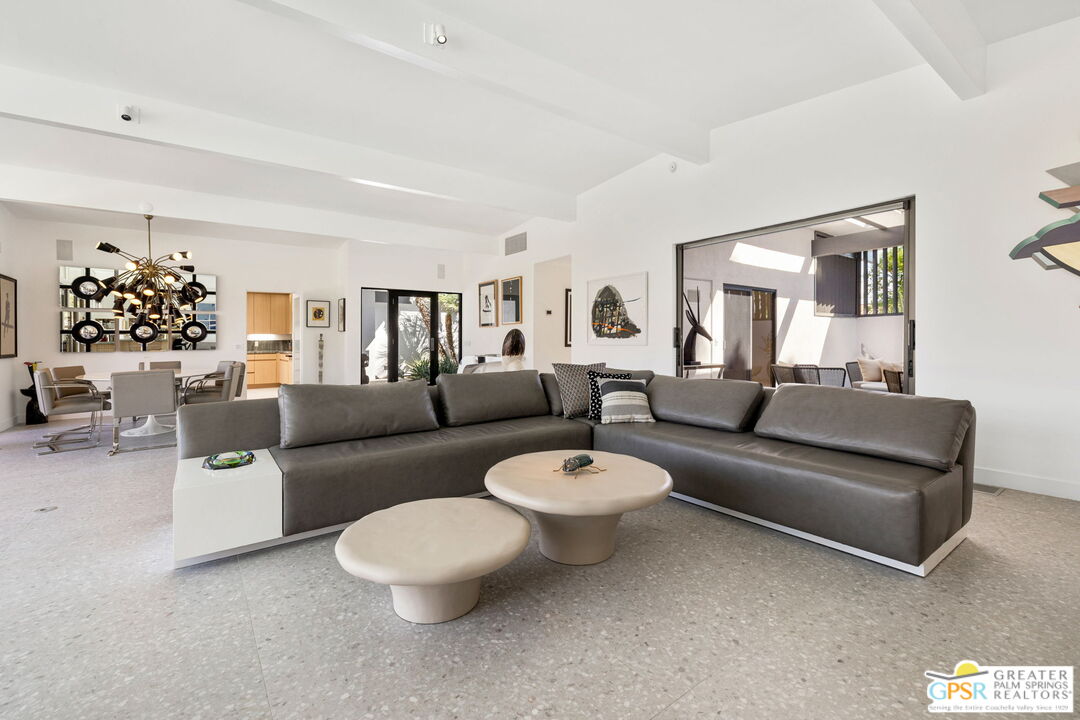 40181 Sand Dune Road Rancho Mirage, CA 92270 - Photo 14 of 75 a living room with furniture and a large window