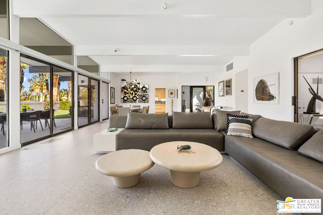 40181 Sand Dune Road Rancho Mirage, CA 92270 - Photo 18 of 75 a living room with furniture and a large window