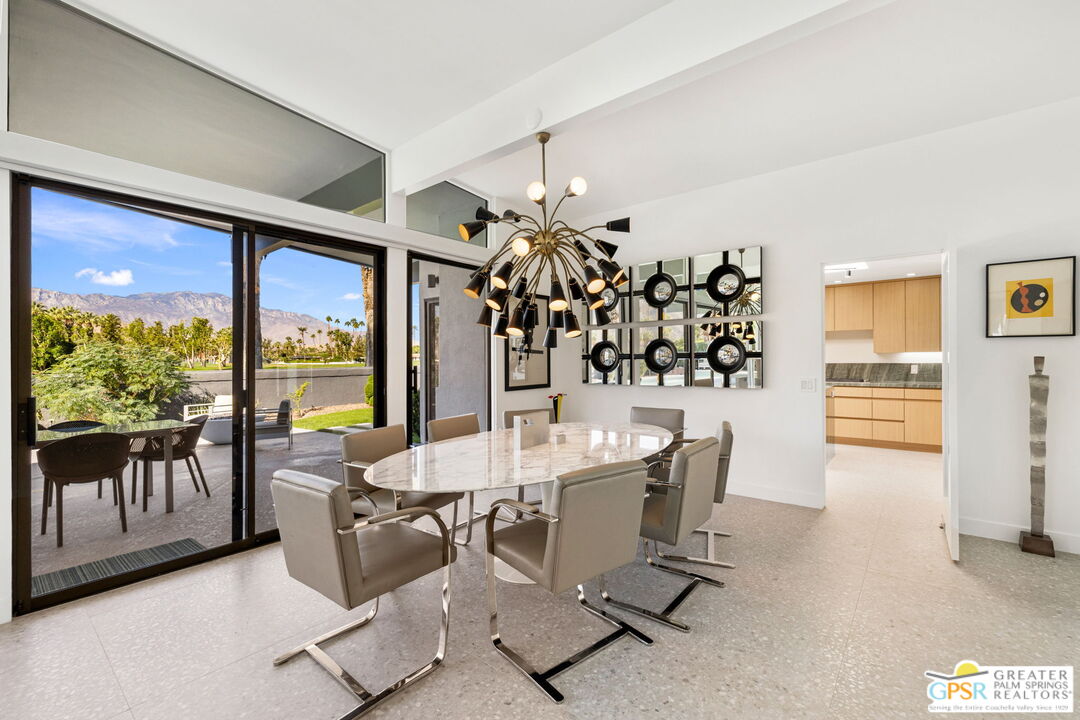 40181 Sand Dune Road Rancho Mirage, CA 92270 - Photo 20 of 75 a view of a dining room with furniture window and outside view