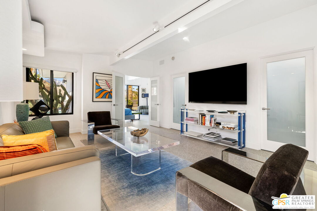 40181 Sand Dune Road Rancho Mirage, CA 92270 - Photo 46 of 75 a living room with furniture and a flat screen tv