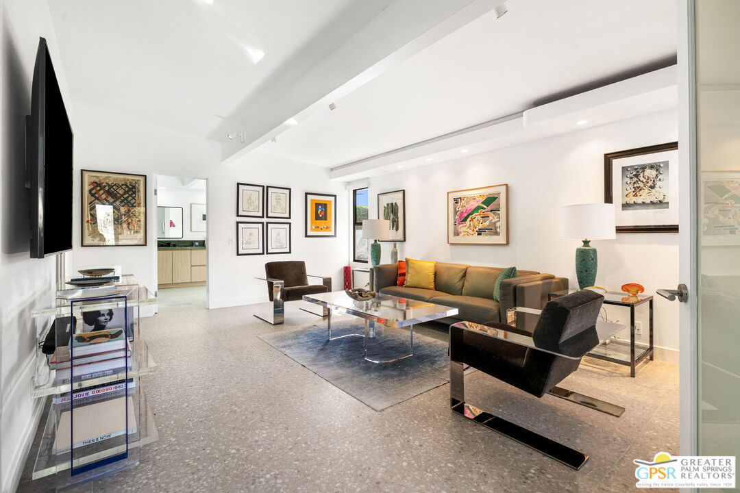 40181 Sand Dune Road Rancho Mirage, CA 92270 - Photo 48 of 75 a living room with furniture and a flat screen tv