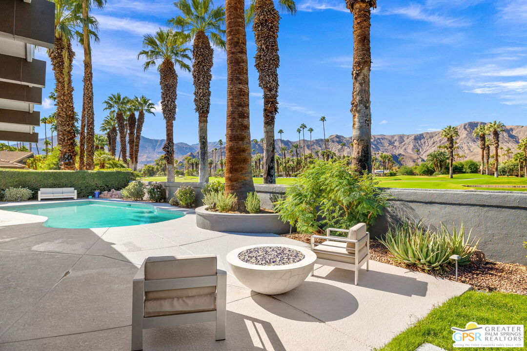40181 Sand Dune Road Rancho Mirage, CA 92270 - Photo 70 of 75 a view of a table and chairs in patio with a yard