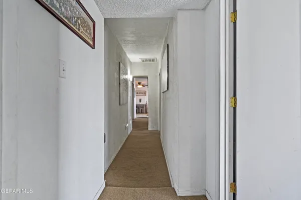 a view of a hallway with a elevator
