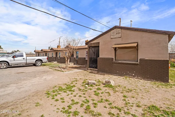 a view of a street with cars
