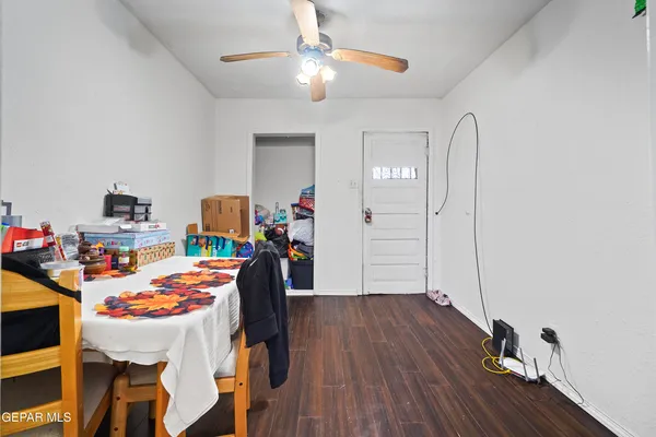 a view of a dining room with wooden floor