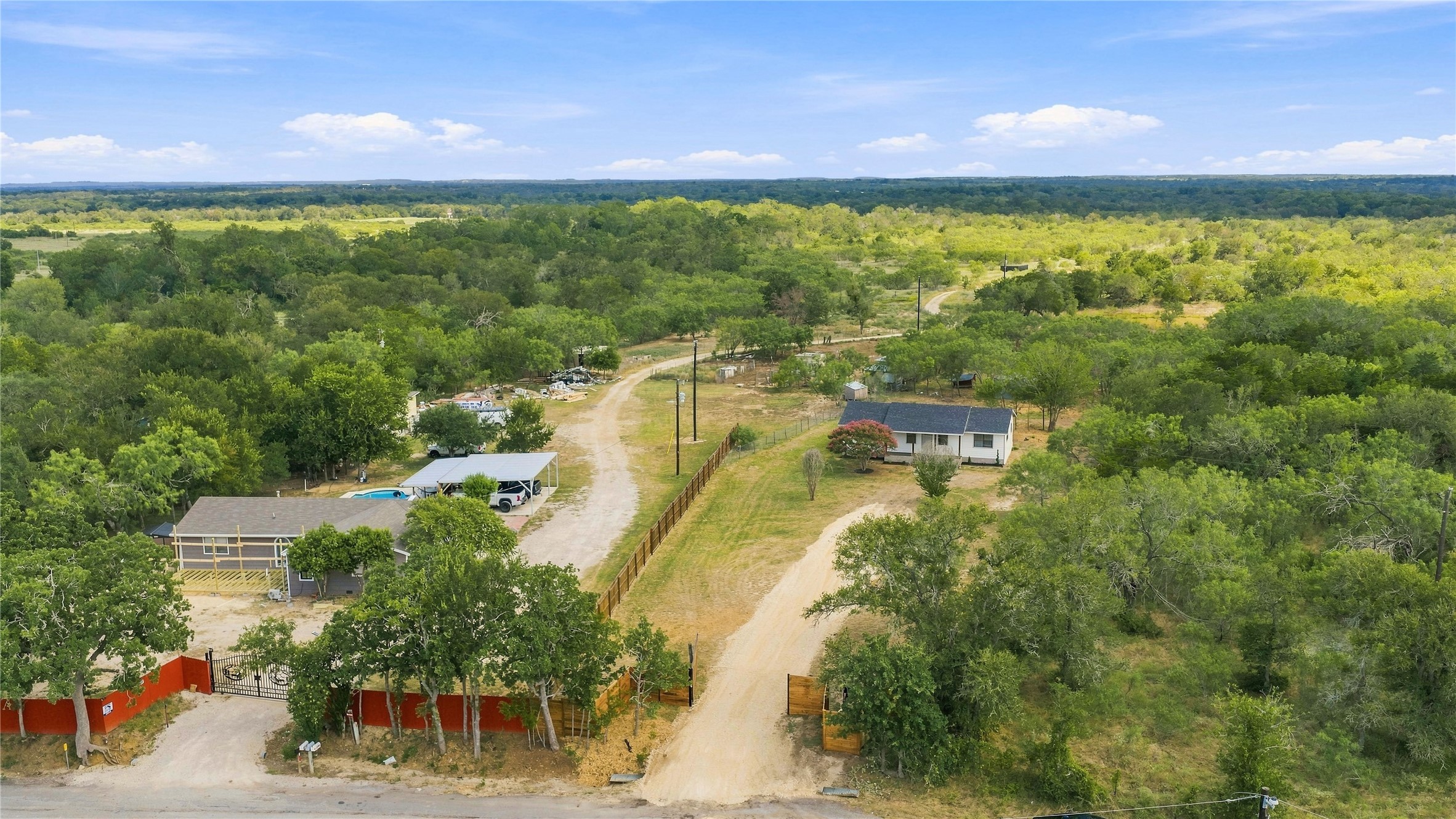 747 Chamberlin Road Dale, TX 78616 - Photo 25 of 28 A private, gated estate with expansive acreage and serene natural surroundings.