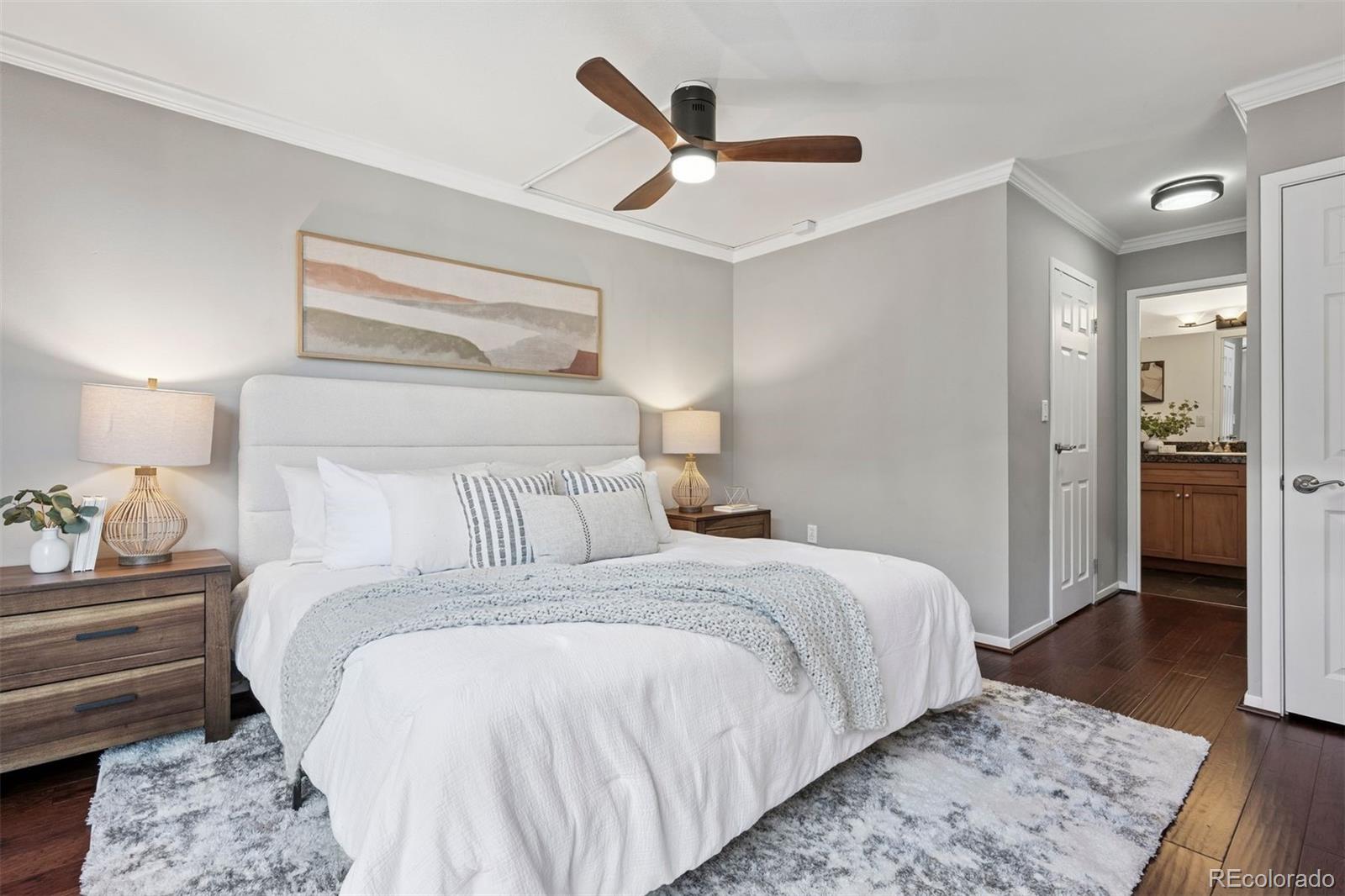 1625 Larimer Street, Unit 1208 Denver, CO 80202 - Photo 12 of 41 a bedroom with a bed and a dresser