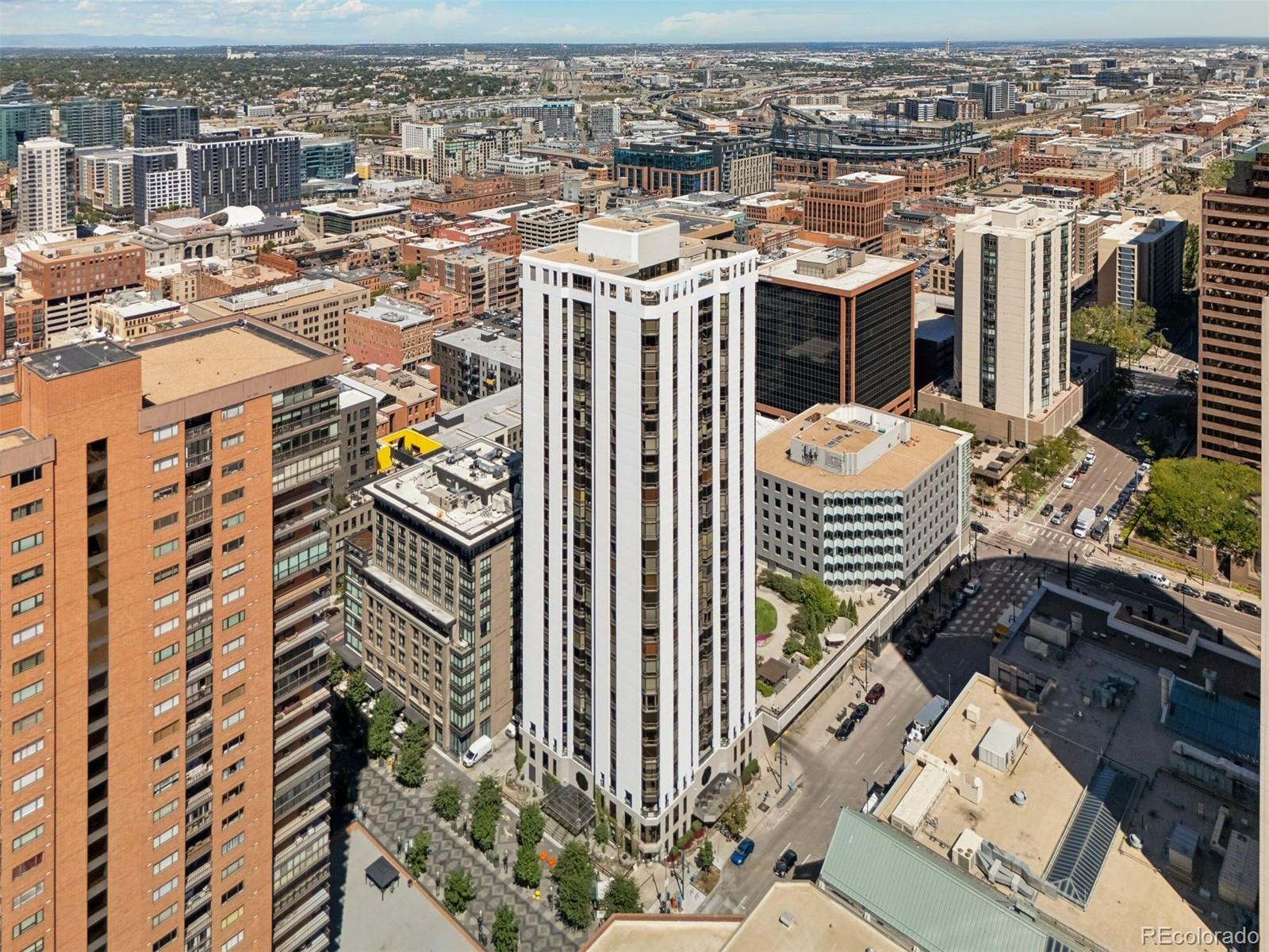 1625 Larimer Street, Unit 1208 Denver, CO 80202 - Photo 36 of 41 a view of a balcony with many windows