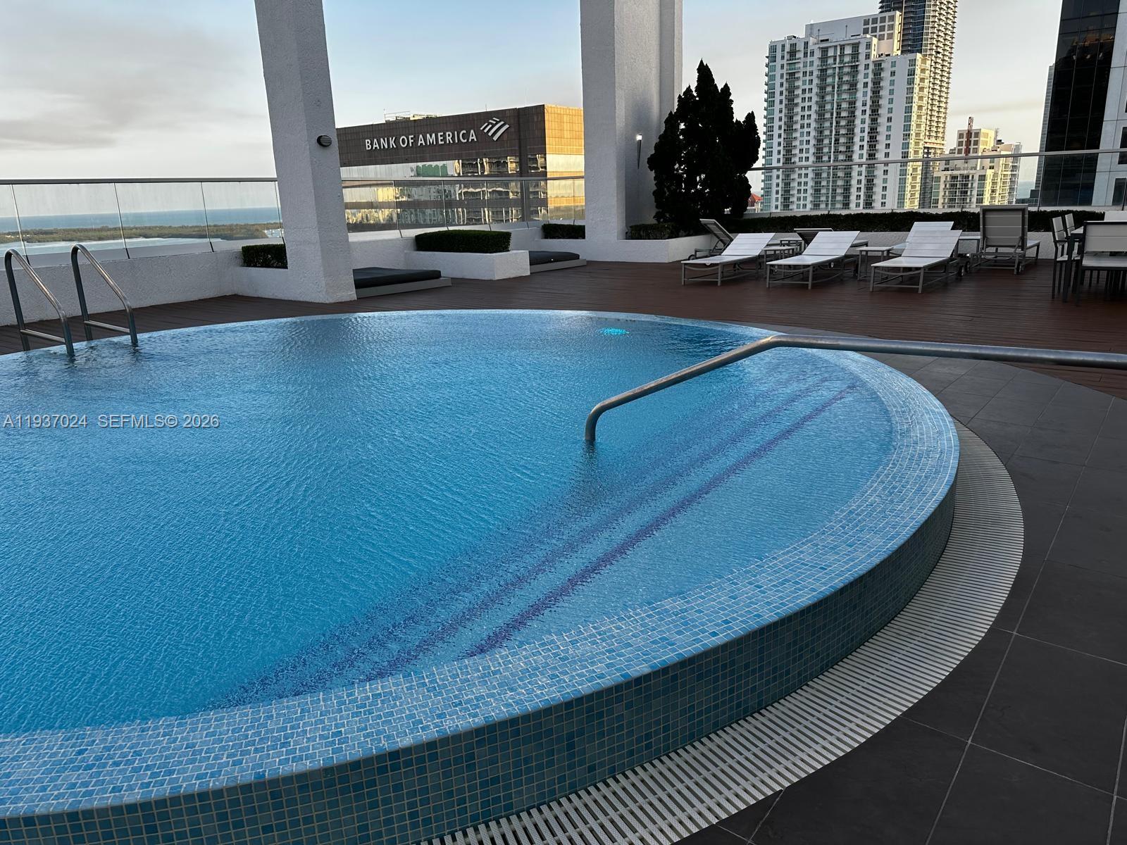 500 Brickell Avenue, Unit 3307 Miami, FL 33131 - Photo 23 of 30 wooden floor with outdoor seating