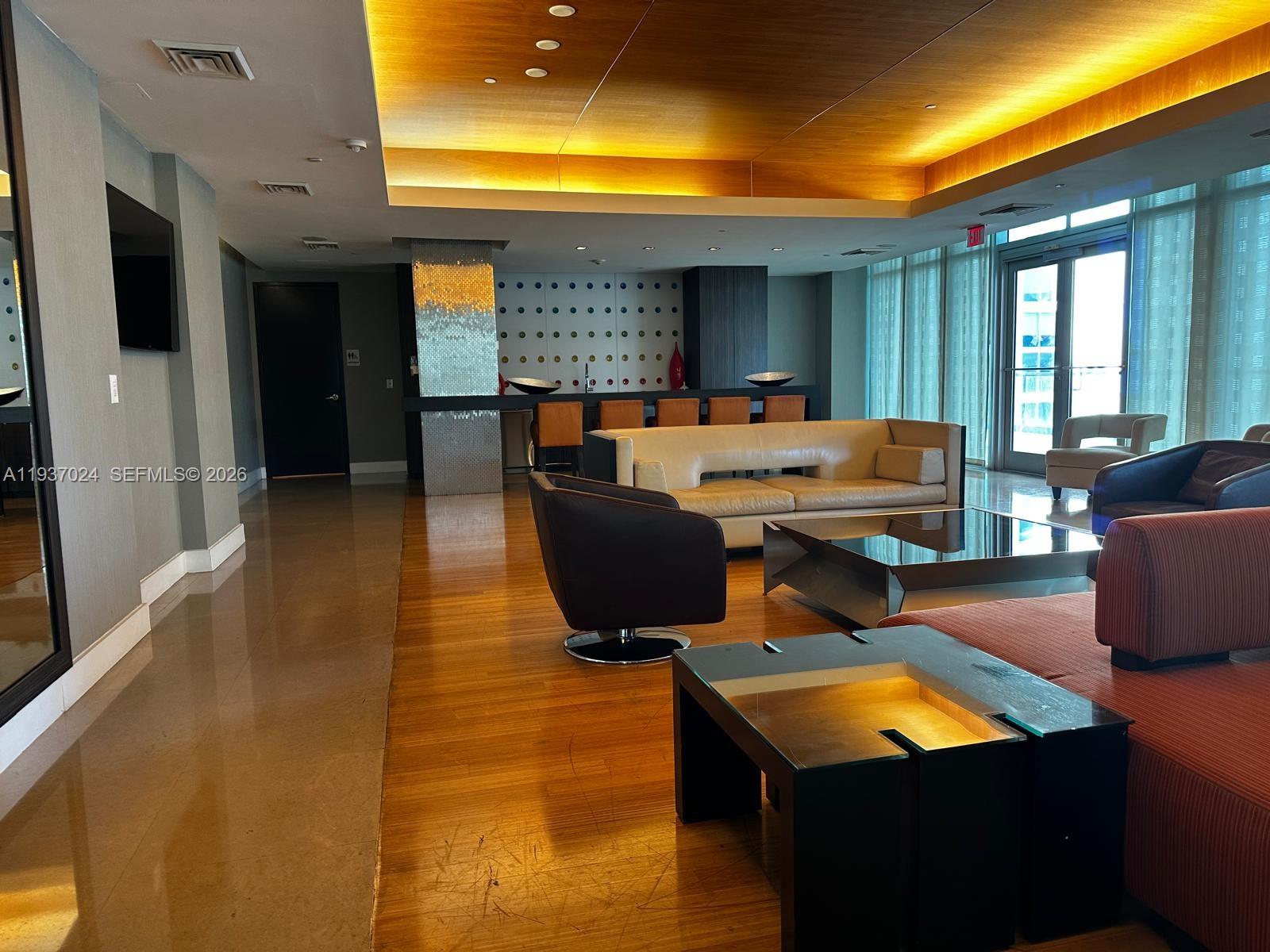 500 Brickell Avenue, Unit 3307 Miami, FL 33131 - Photo 27 of 30 a outdoor living space with furniture