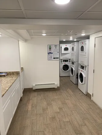 a view of a storage & utility room with washer and dryer