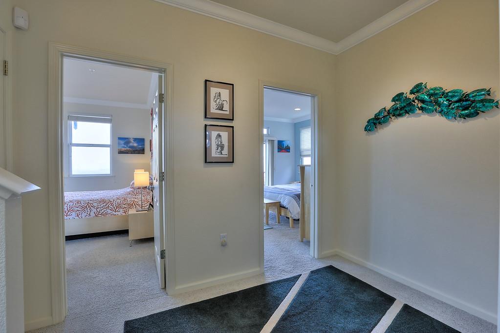 522 Monterey Road, Unit B Pacifica, CA 94044 - Photo 54 of 72 a room that has a bed and a view of bathroom