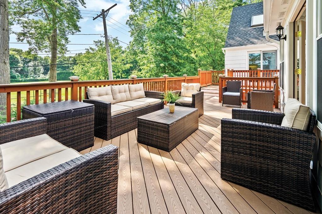 118 Wallis Road Brookline, MA 02467 - Photo 26 of 29 a view of a wooden deck with furniture