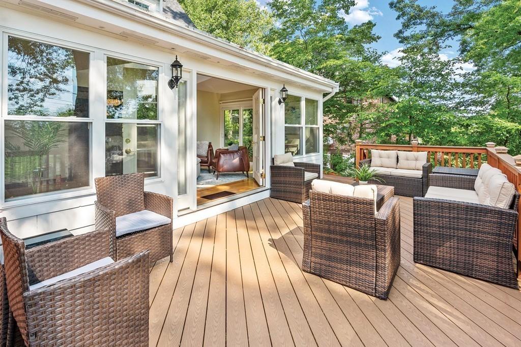 118 Wallis Road Brookline, MA 02467 - Photo 27 of 29 a balcony with wooden floor and furniture