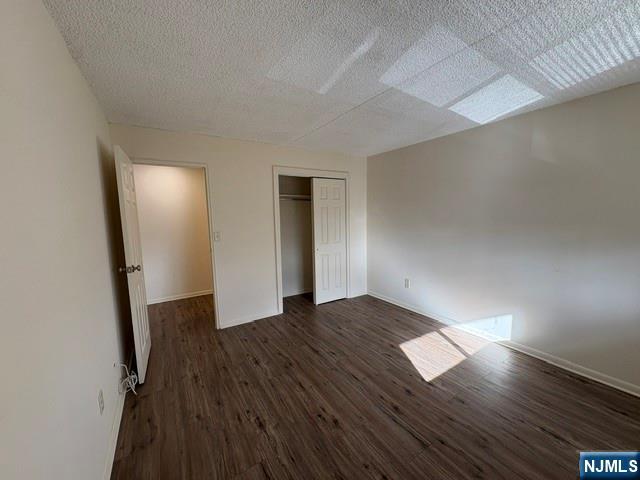 1 Simone Place, Unit 2F Bergenfield, NJ 07621 - Photo 9 of 13 a view of an empty room with wooden floor