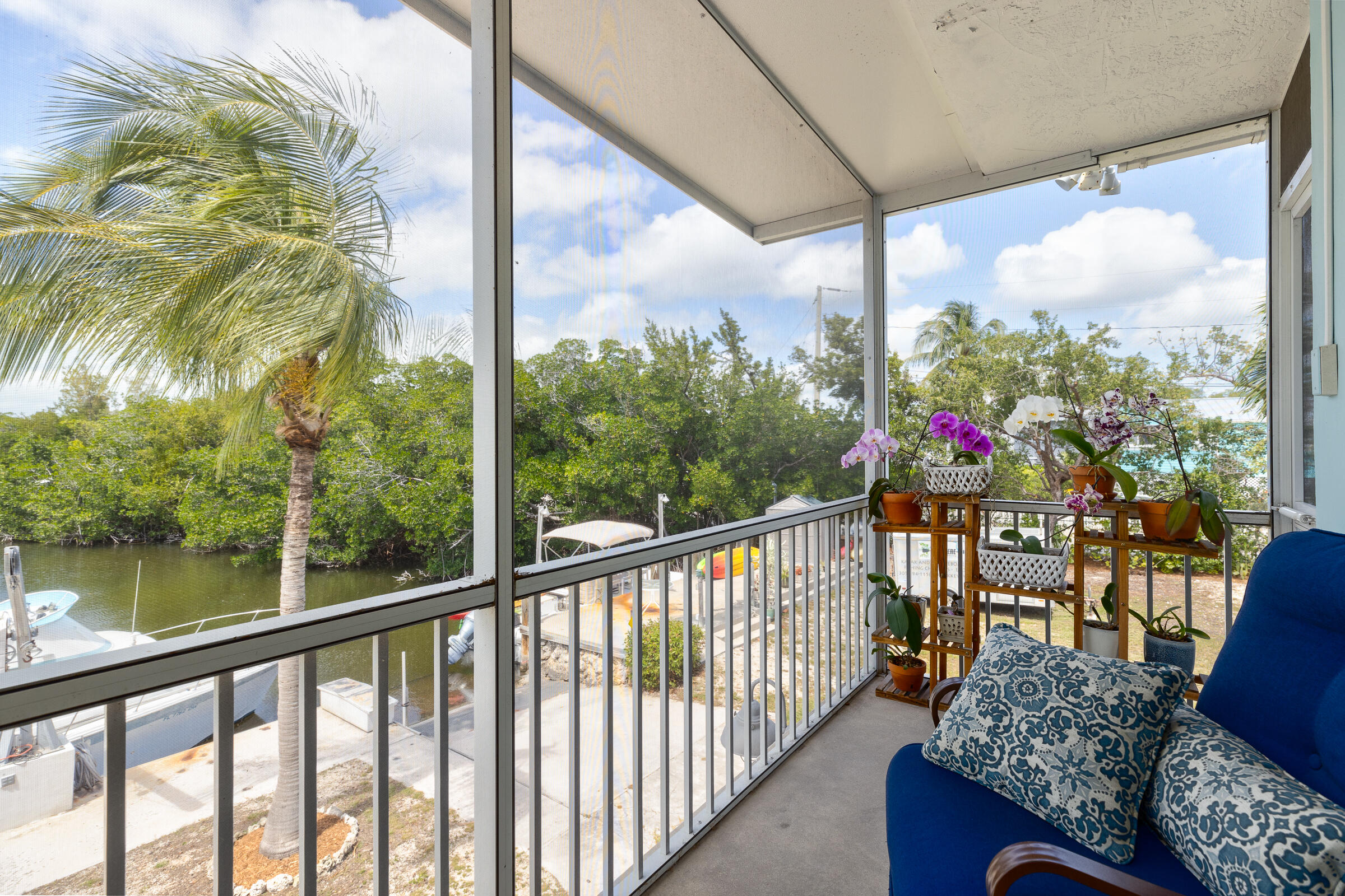 39 Lake Shore Drive Key Largo, FL 33037 - Photo 24 of 47 a view of a chairs and table in the balcony