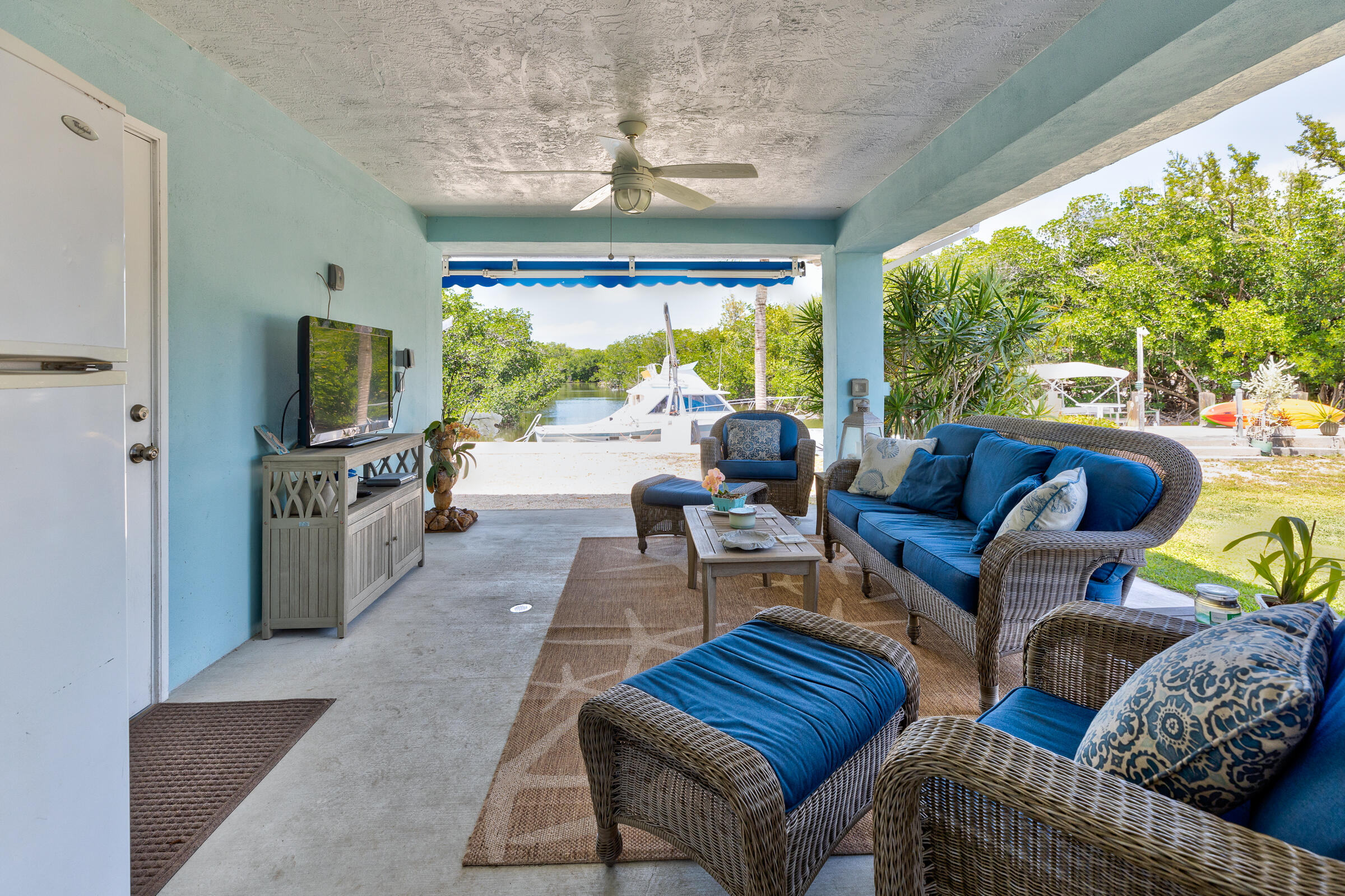 39 Lake Shore Drive Key Largo, FL 33037 - Photo 25 of 47 a living room with furniture and a flat screen tv