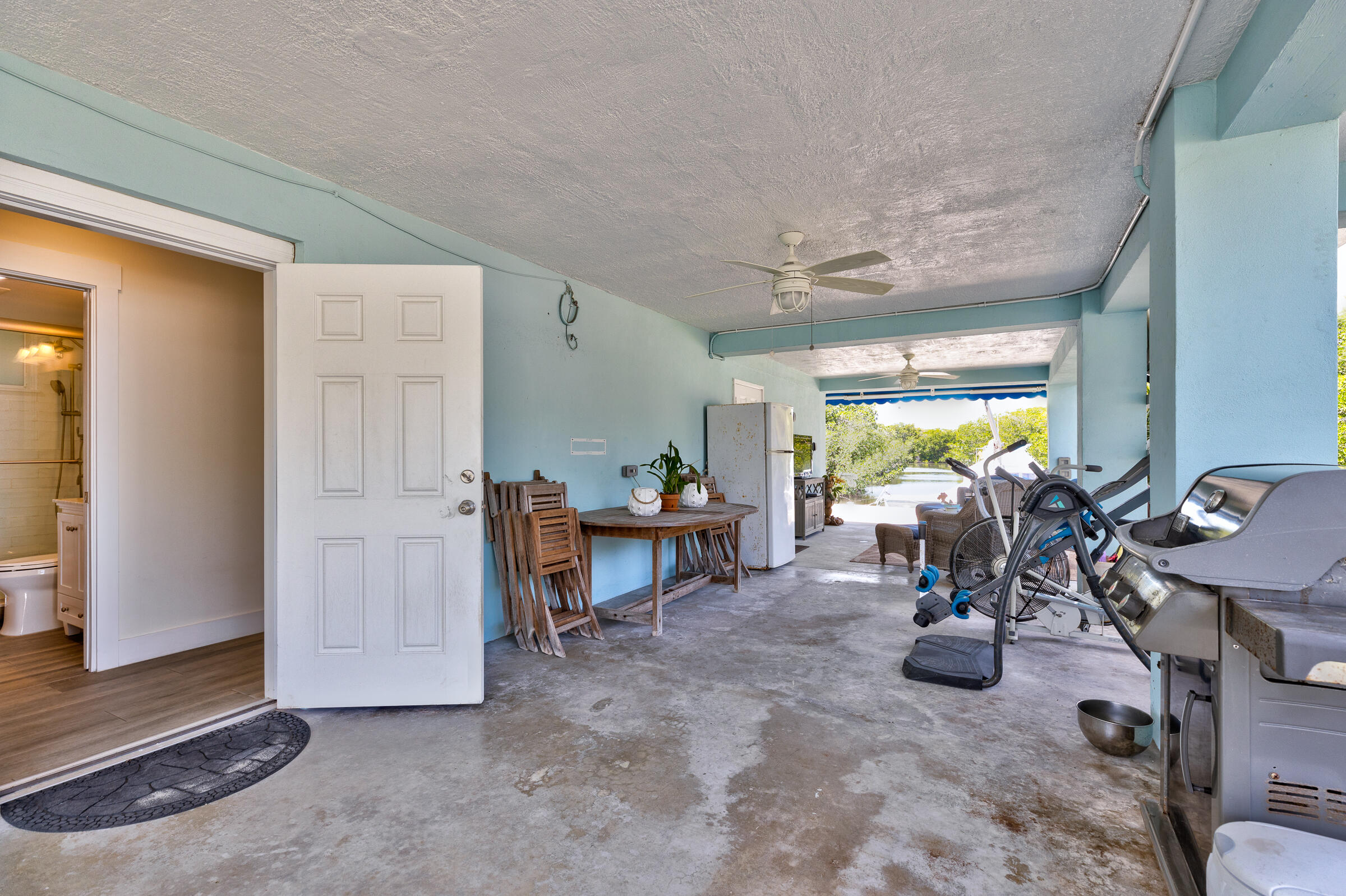 39 Lake Shore Drive Key Largo, FL 33037 - Photo 26 of 47 a view of a dining room with furniture