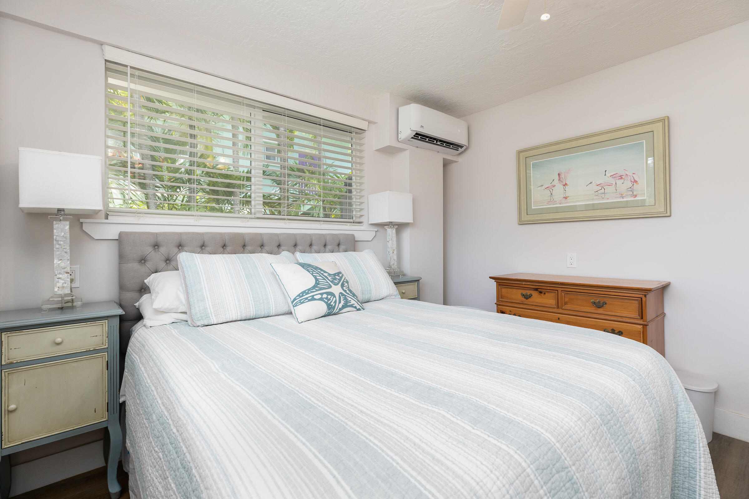 39 Lake Shore Drive Key Largo, FL 33037 - Photo 33 of 47 a bedroom with a bed and a window