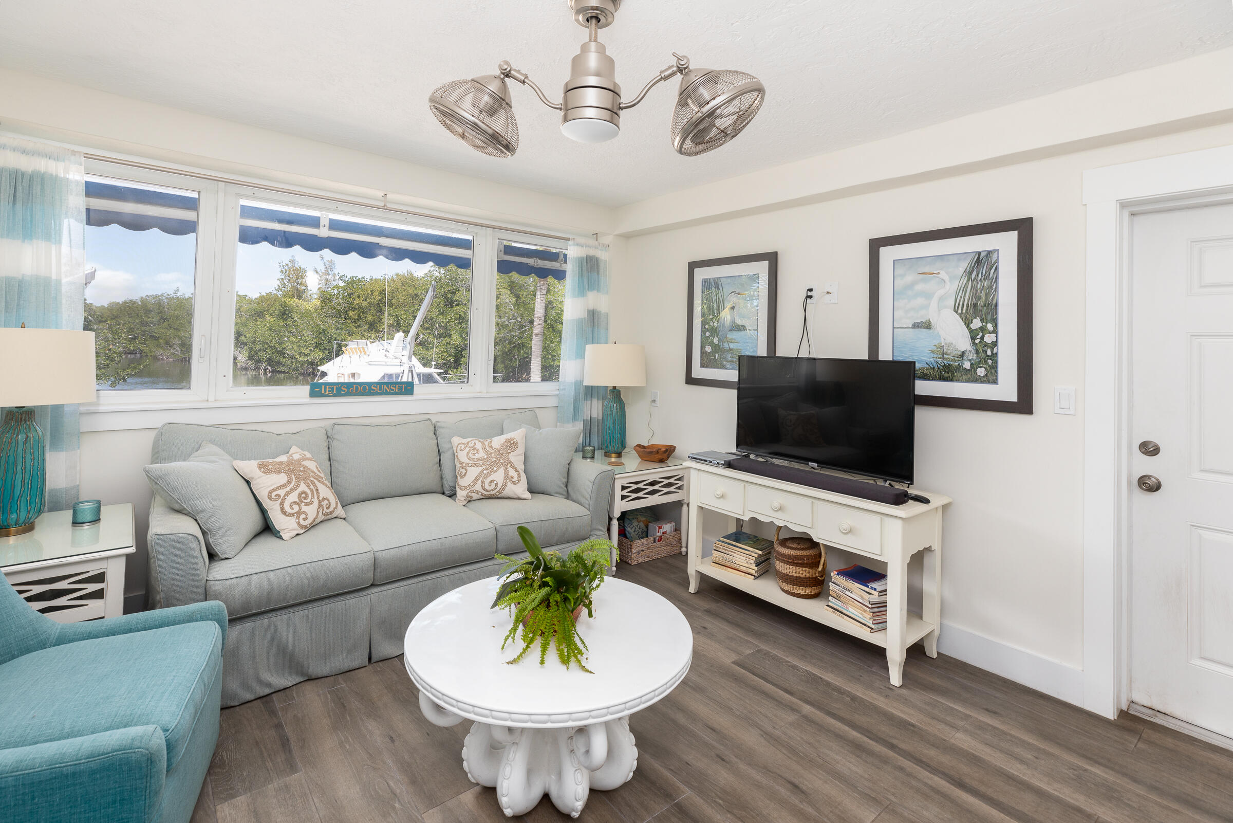 39 Lake Shore Drive Key Largo, FL 33037 - Photo 35 of 47 a living room with furniture and a flat screen tv