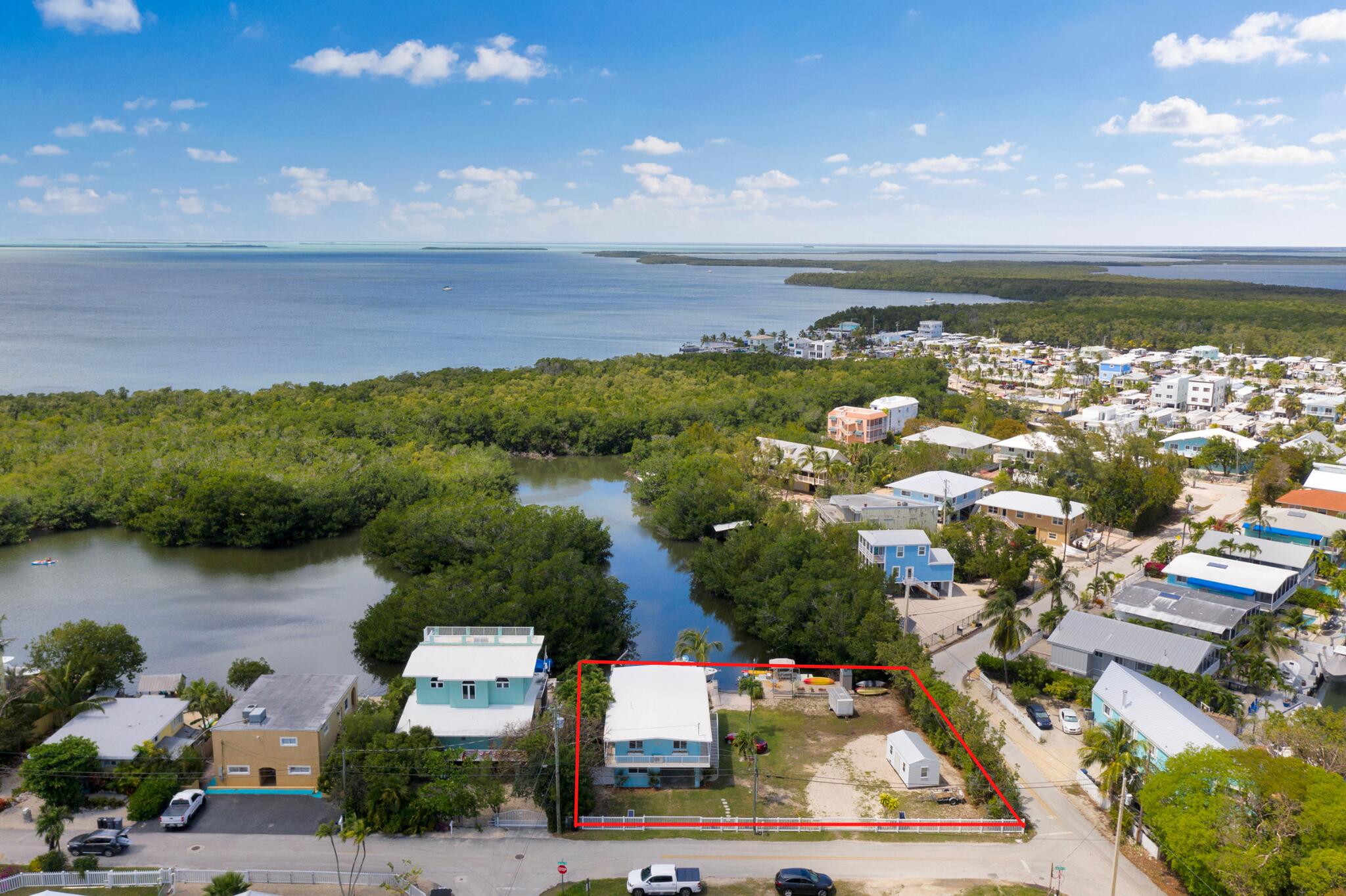 39 Lake Shore Drive Key Largo, FL 33037 - Photo 45 of 47 an aerial view of ocean and residential houses with outdoor space