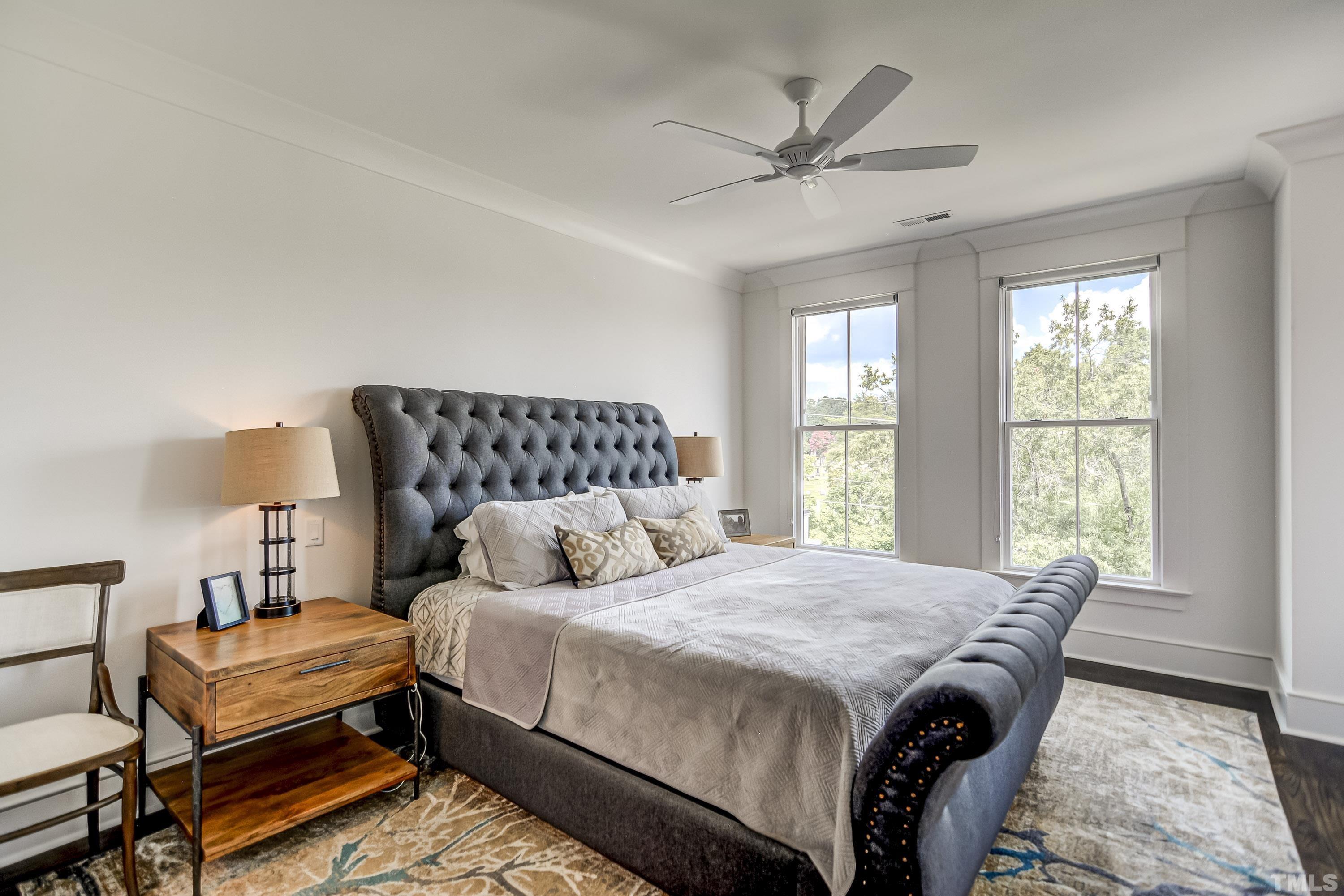 118 South East Street Raleigh, NC 27601 - Photo 19 of 40 a bedroom with a bed and window