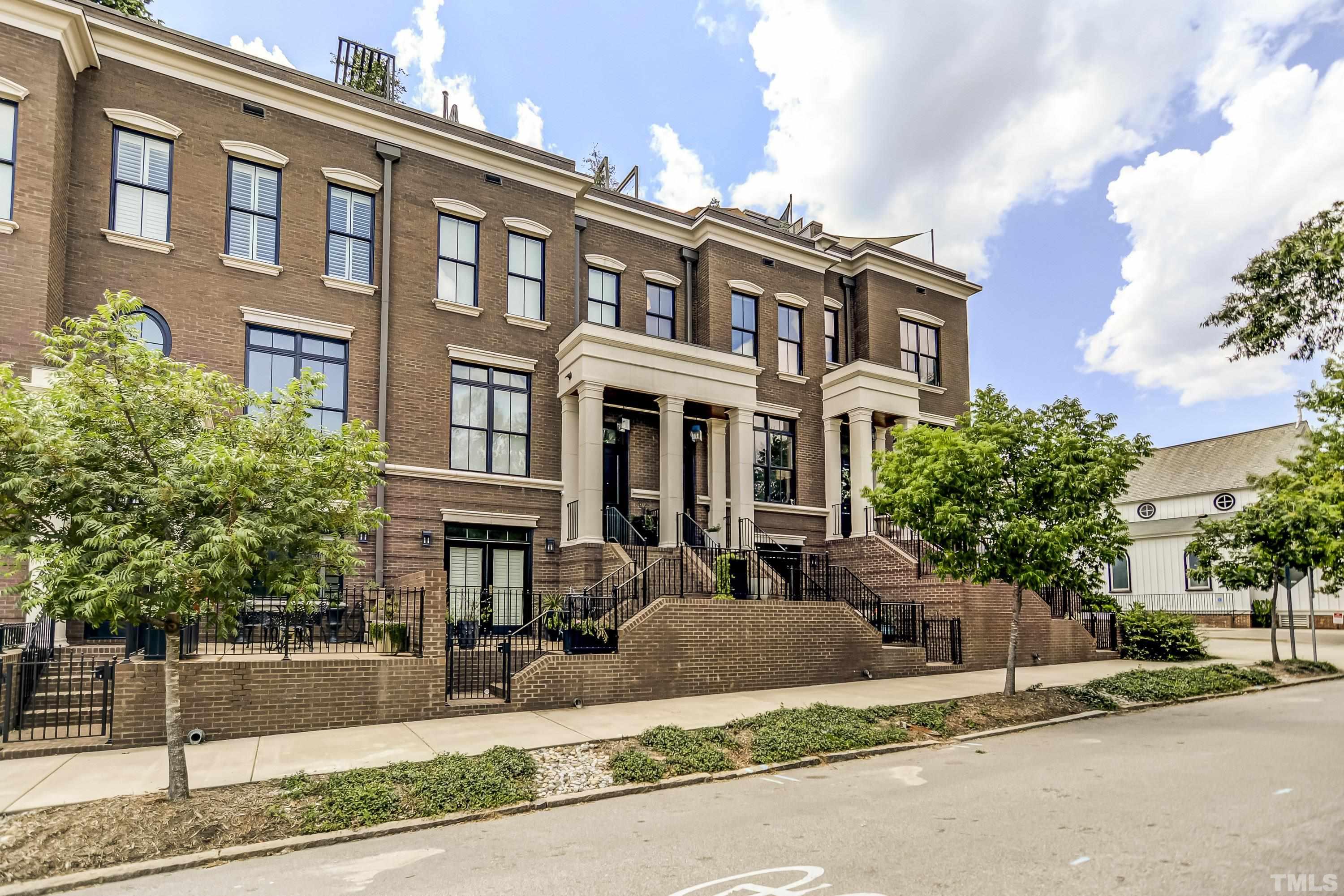 118 South East Street Raleigh, NC 27601 - Photo 2 of 40 a front view of a building with street view