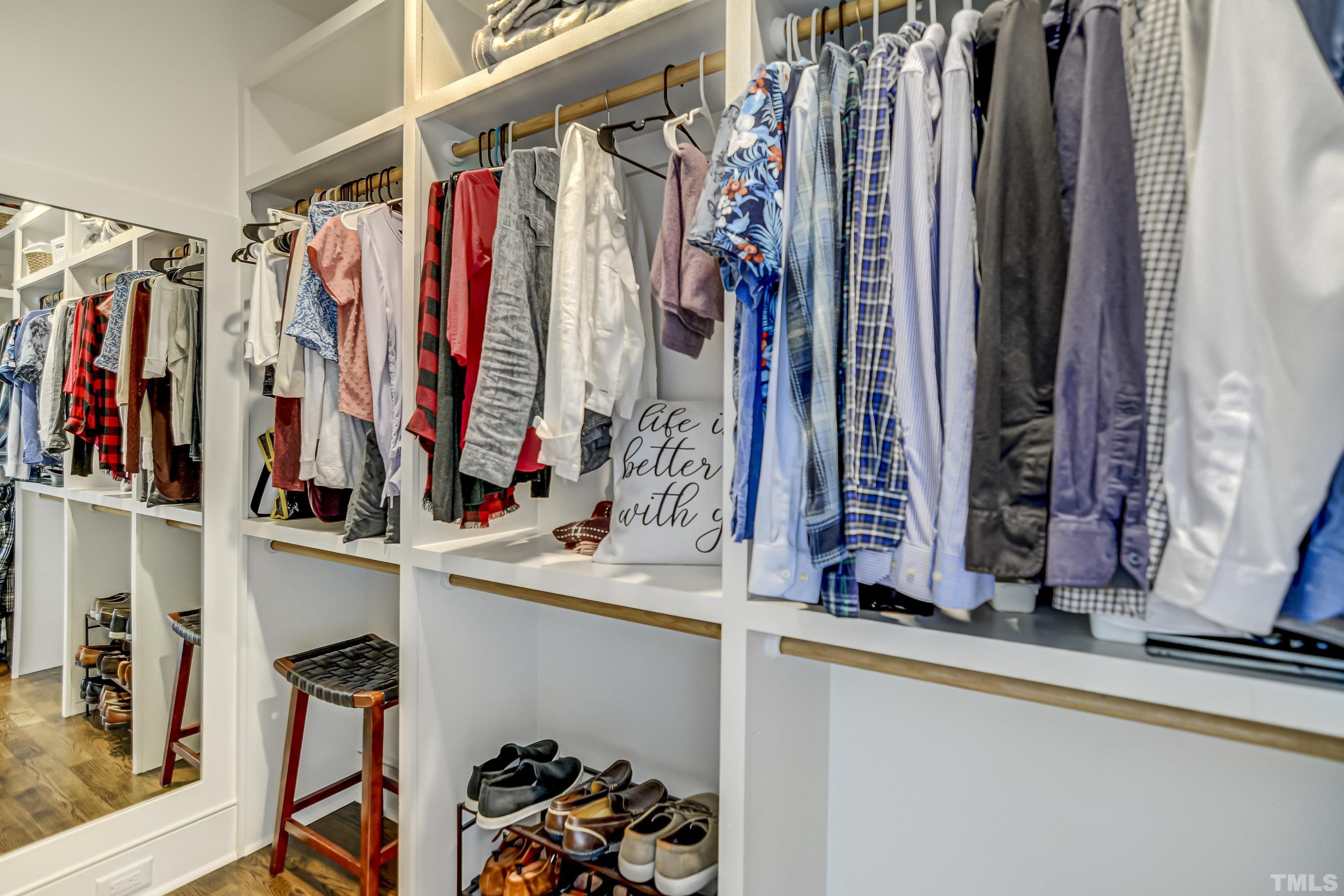 118 South East Street Raleigh, NC 27601 - Photo 22 of 40 a view of walk in closet with clothes