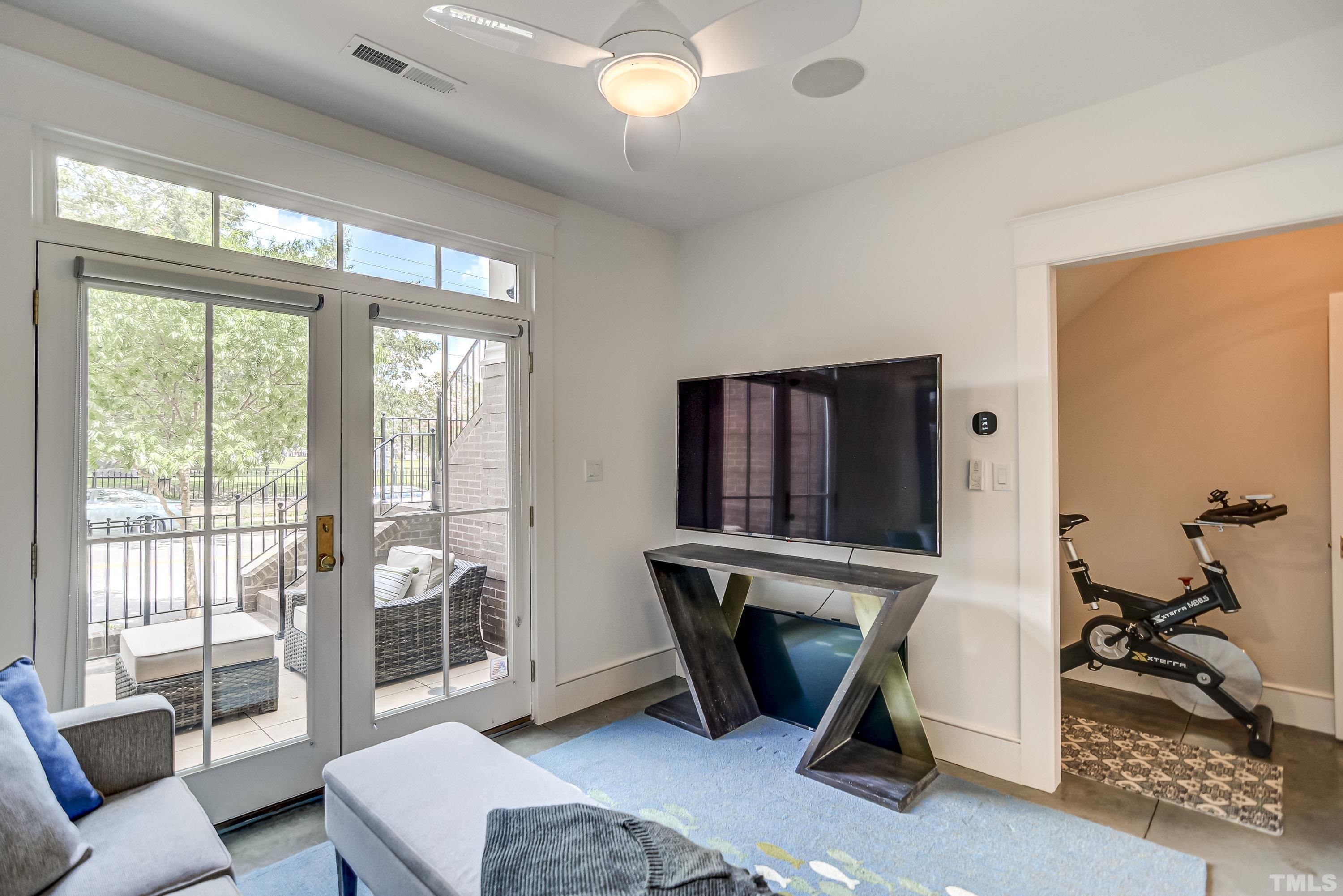 118 South East Street Raleigh, NC 27601 - Photo 28 of 40 a view of room with workspace and windows