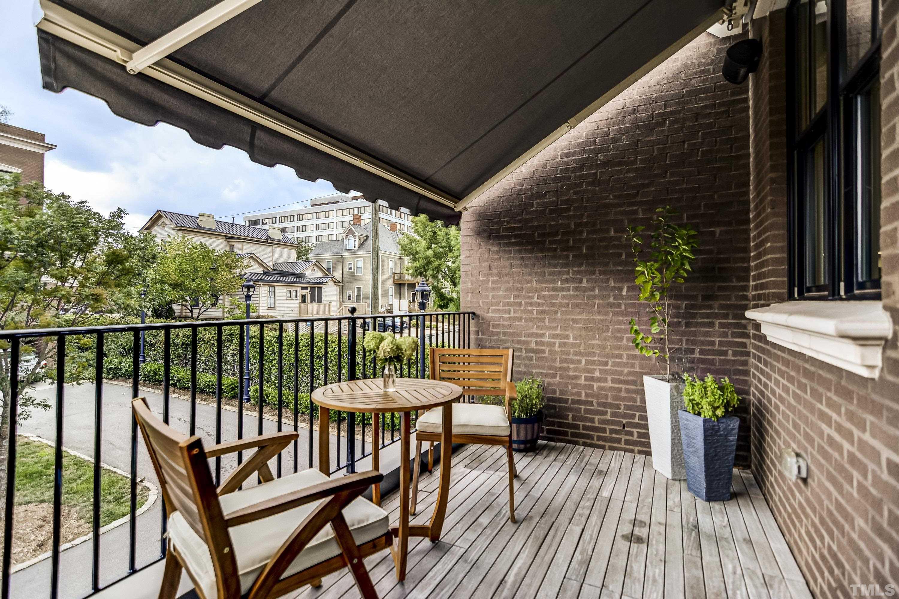 118 South East Street Raleigh, NC 27601 - Photo 32 of 40 a view of a balcony with a patio