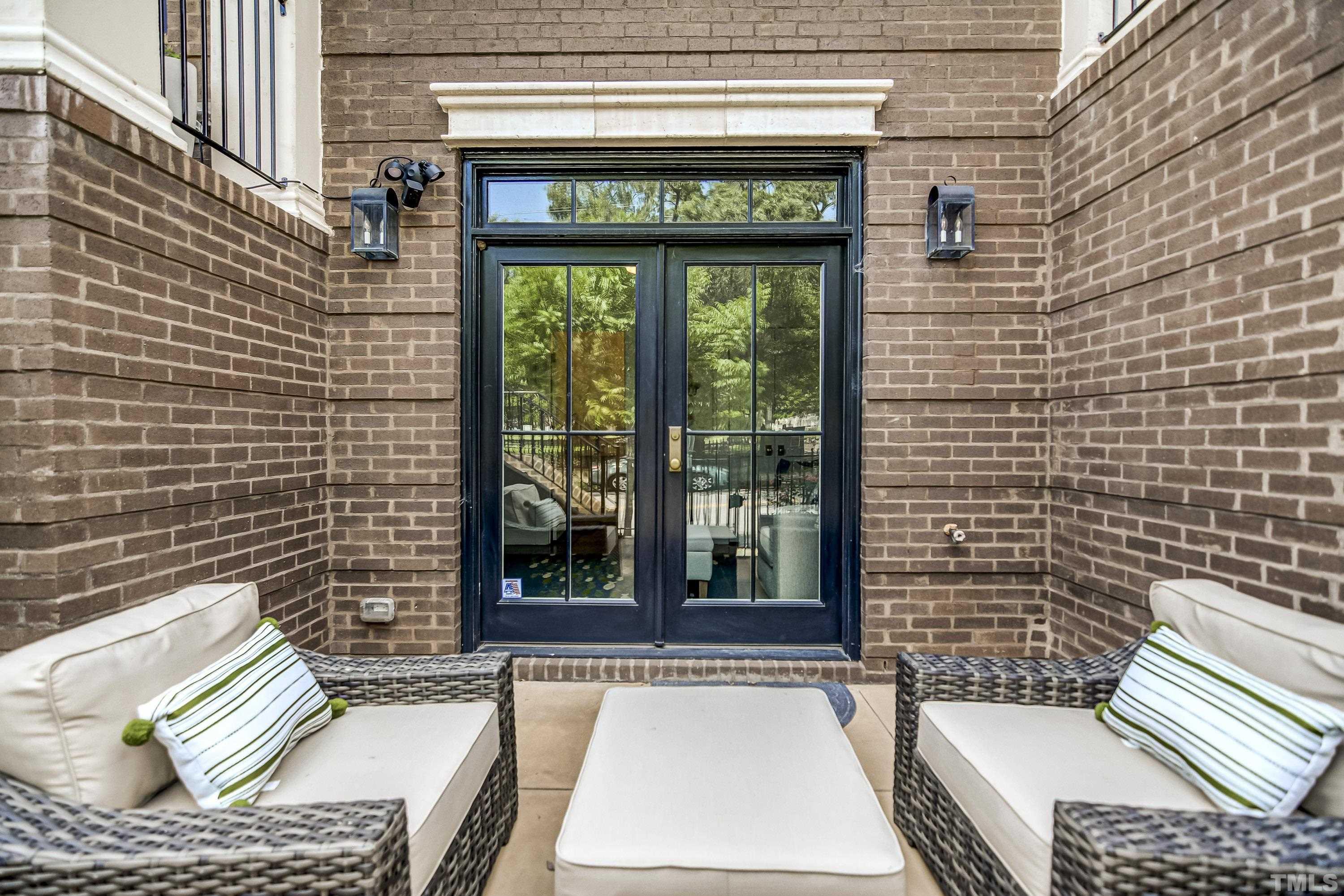 118 South East Street Raleigh, NC 27601 - Photo 33 of 40 a view of a two chairs in the patio