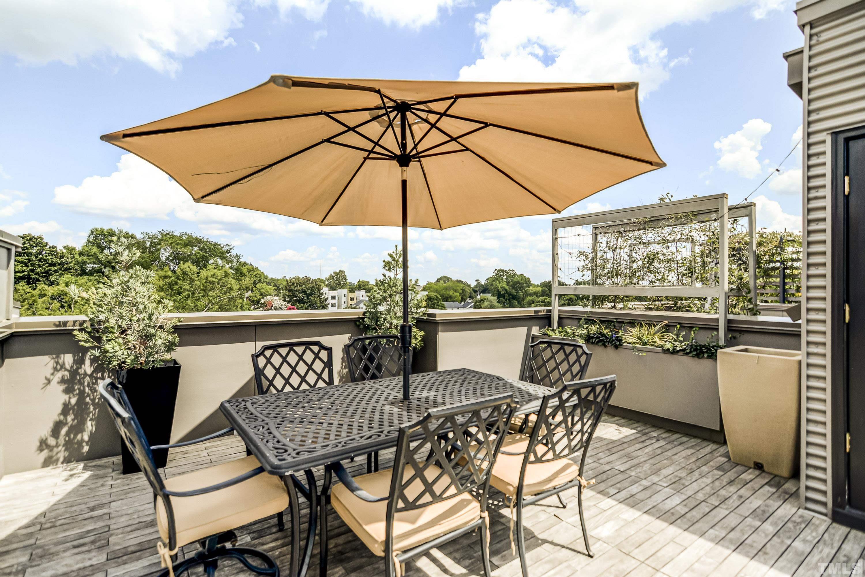 118 South East Street Raleigh, NC 27601 - Photo 34 of 40 a view of a chair and table in the terrace