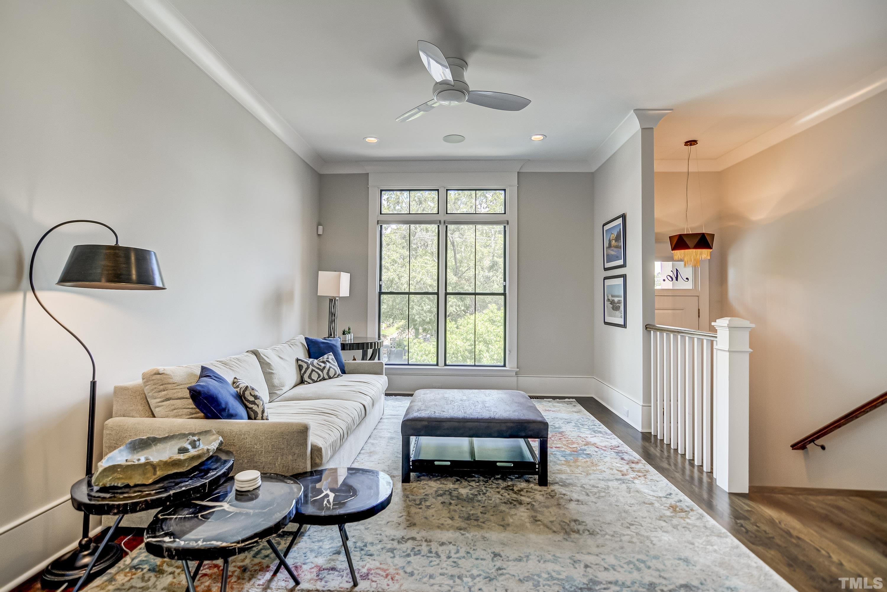 118 South East Street Raleigh, NC 27601 - Photo 7 of 40 a living room with furniture and a window