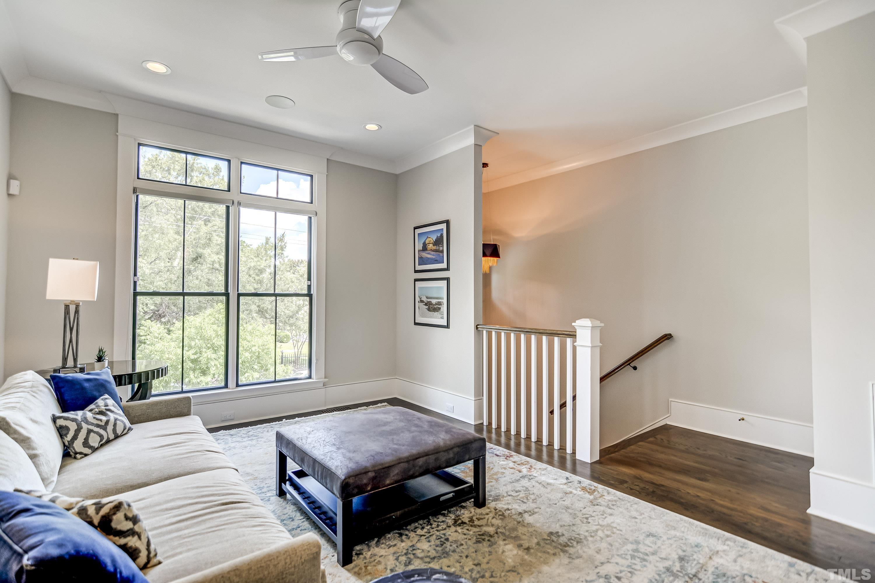 118 South East Street Raleigh, NC 27601 - Photo 8 of 40 a living room with furniture and a window