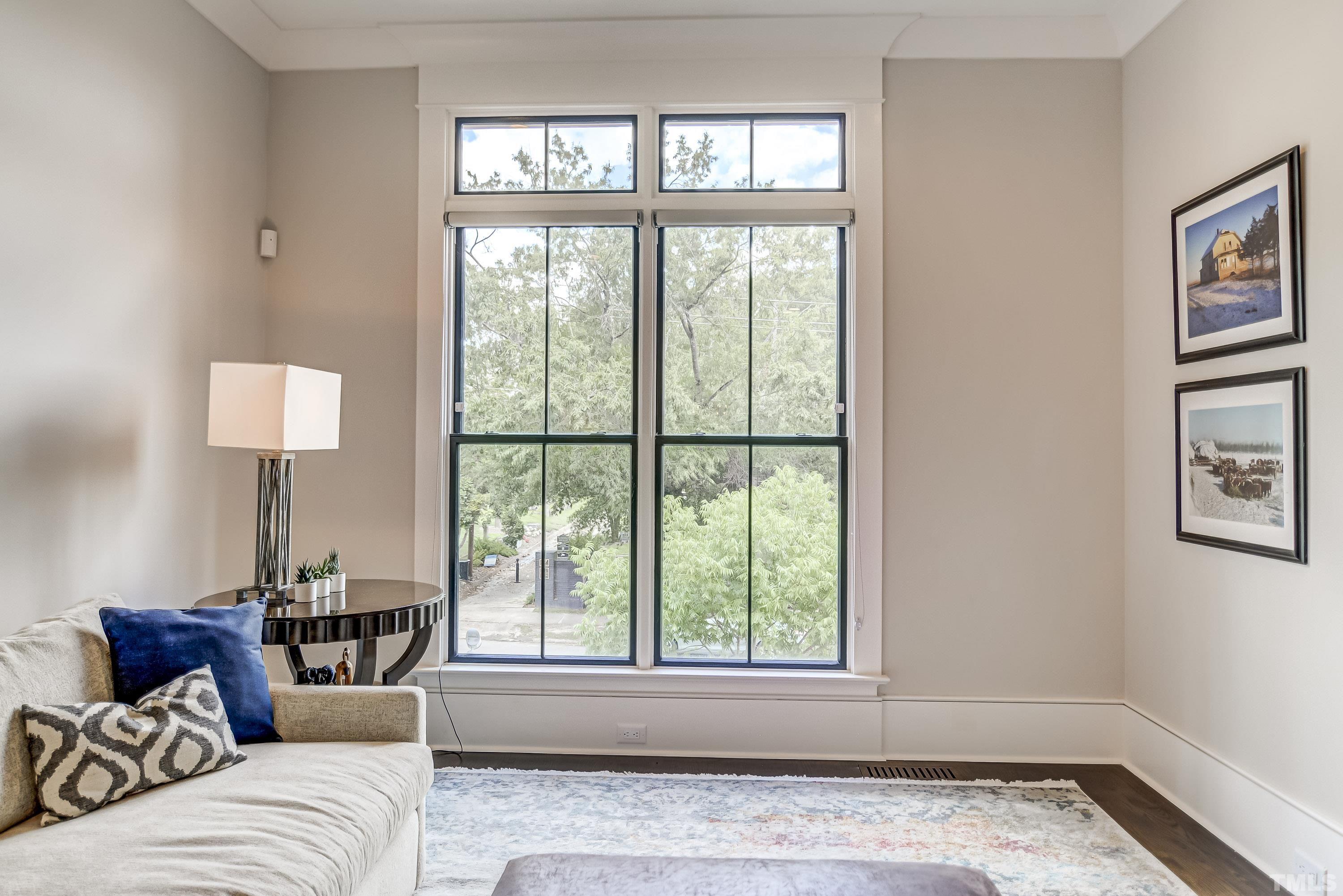 118 South East Street Raleigh, NC 27601 - Photo 9 of 40 a living room with furniture and a window