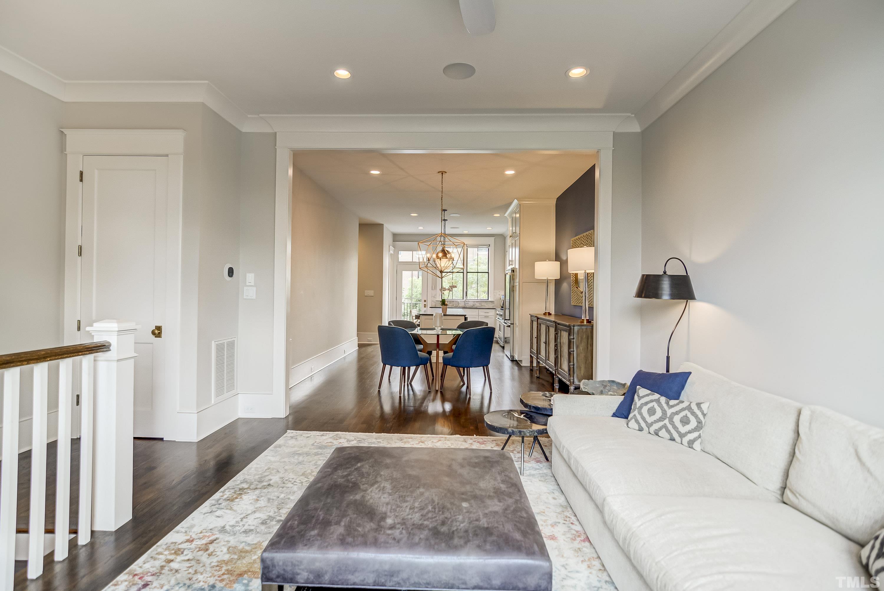 118 South East Street Raleigh, NC 27601 - Photo 10 of 40 a living room with furniture and a table
